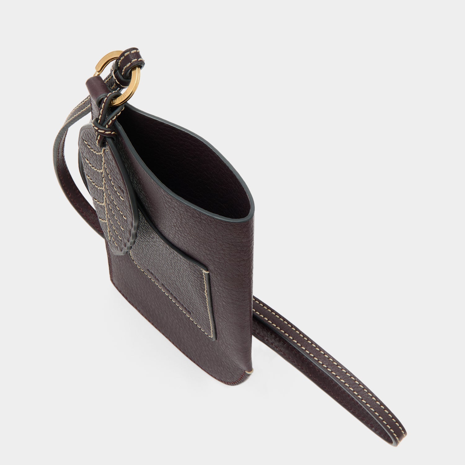 RTN Strap Phone Pouch -

          
            Natural Grain Leather in Grape Purple -
          

          Anya Hindmarch US
