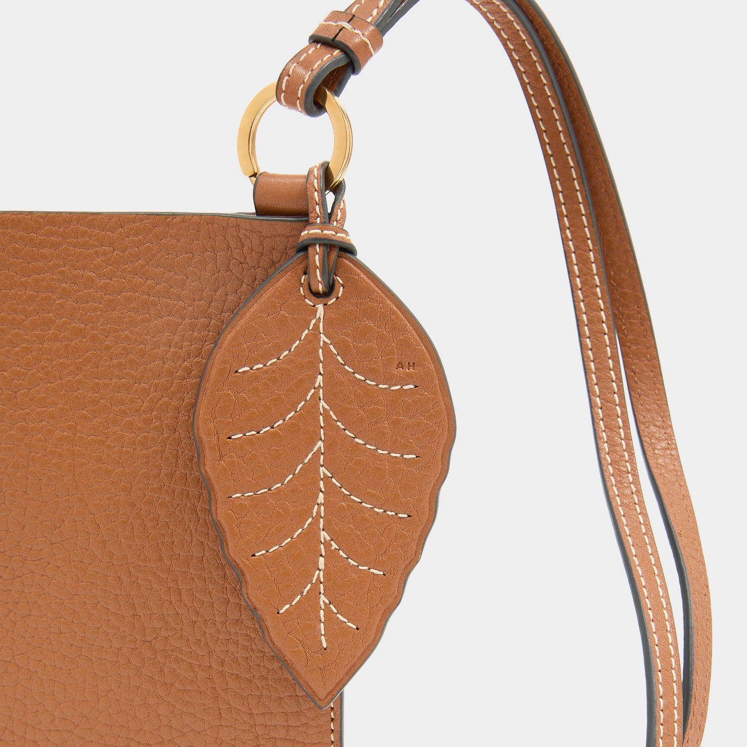 RTN Phone Pouch -

          
            Natural Grain Leather in Pecan -
          

          Anya Hindmarch US
