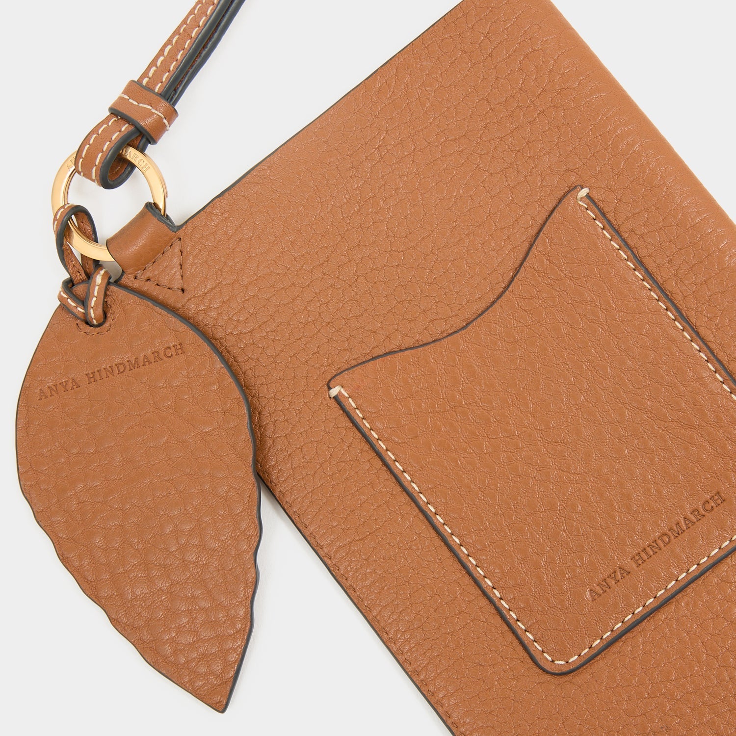 RTN Phone Pouch -

          
            Natural Grain Leather in Pecan -
          

          Anya Hindmarch US
