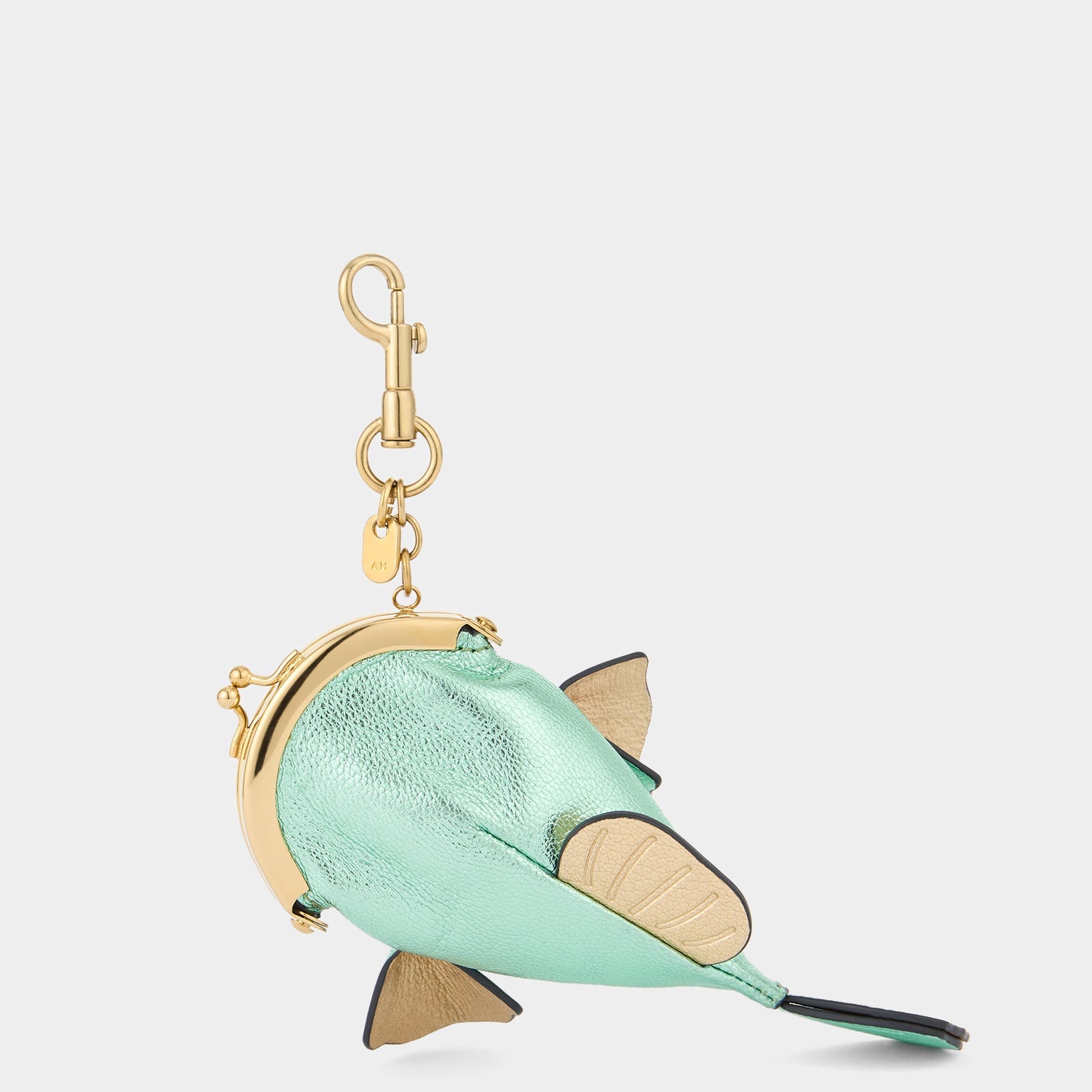 Metallic fish coin purse by Anya Hindmarch