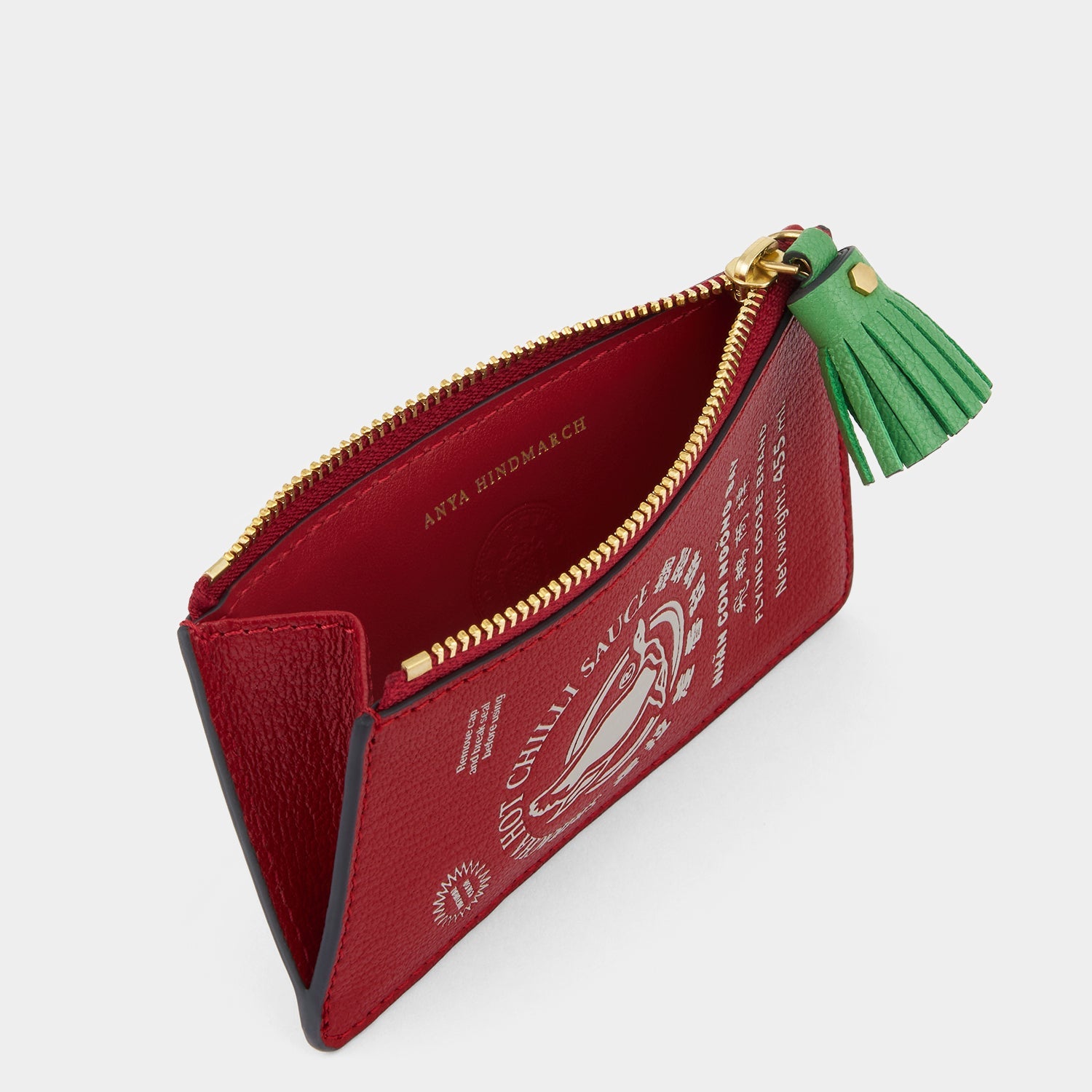 Anya Brands Flying Goose Sriracha Zip Card Case -

          
            Smooth Leather in Russet Red -
          

          Anya Hindmarch US

