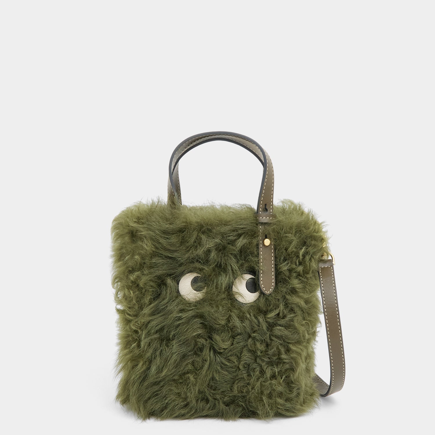 N/S Mini Eyes Shearling Tote -

          
            Shearling/Smooth Leather in Khaki Green -
          

          Anya Hindmarch US
