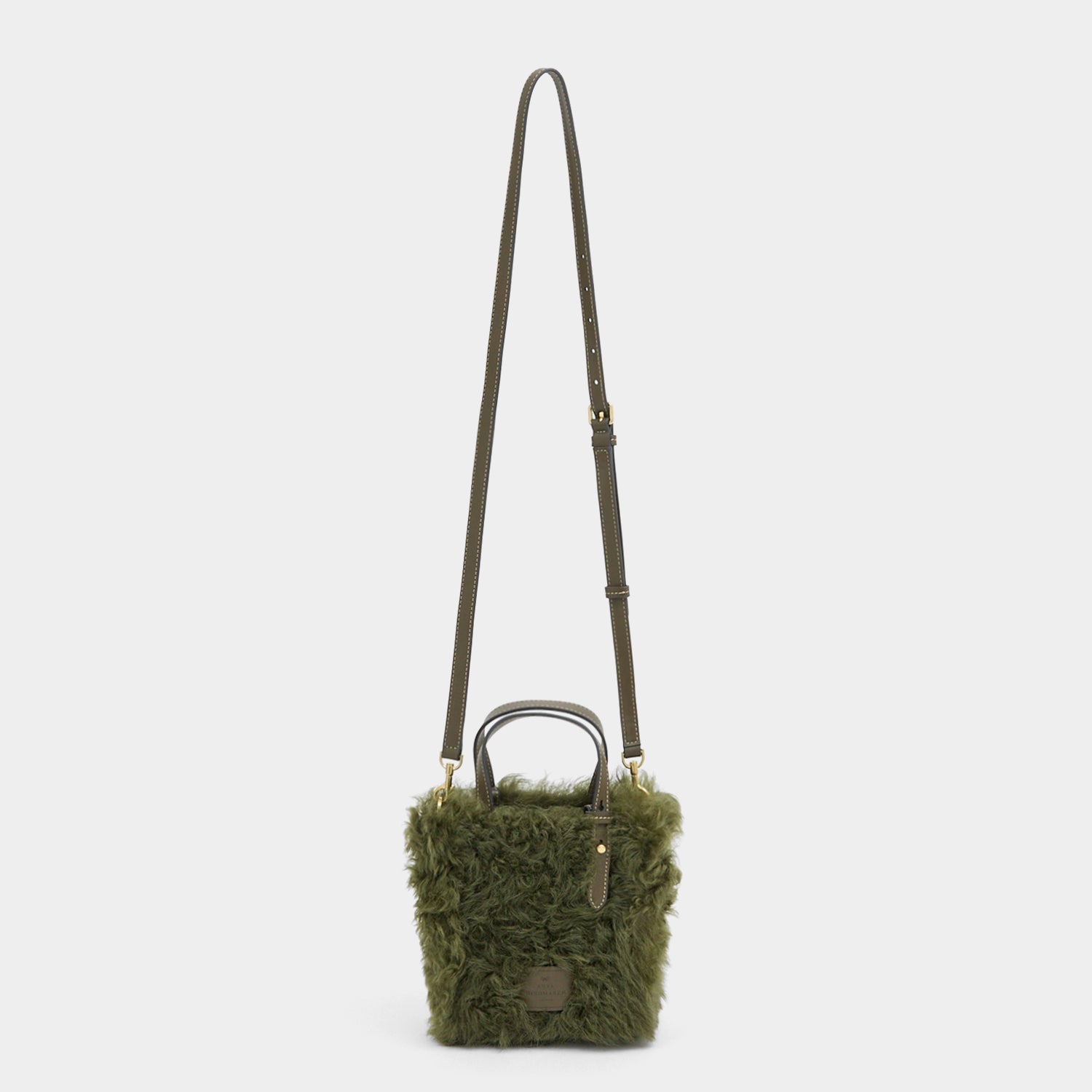 N/S Mini Eyes Shearling Tote -

          
            Shearling/Smooth Leather in Khaki Green -
          

          Anya Hindmarch US
