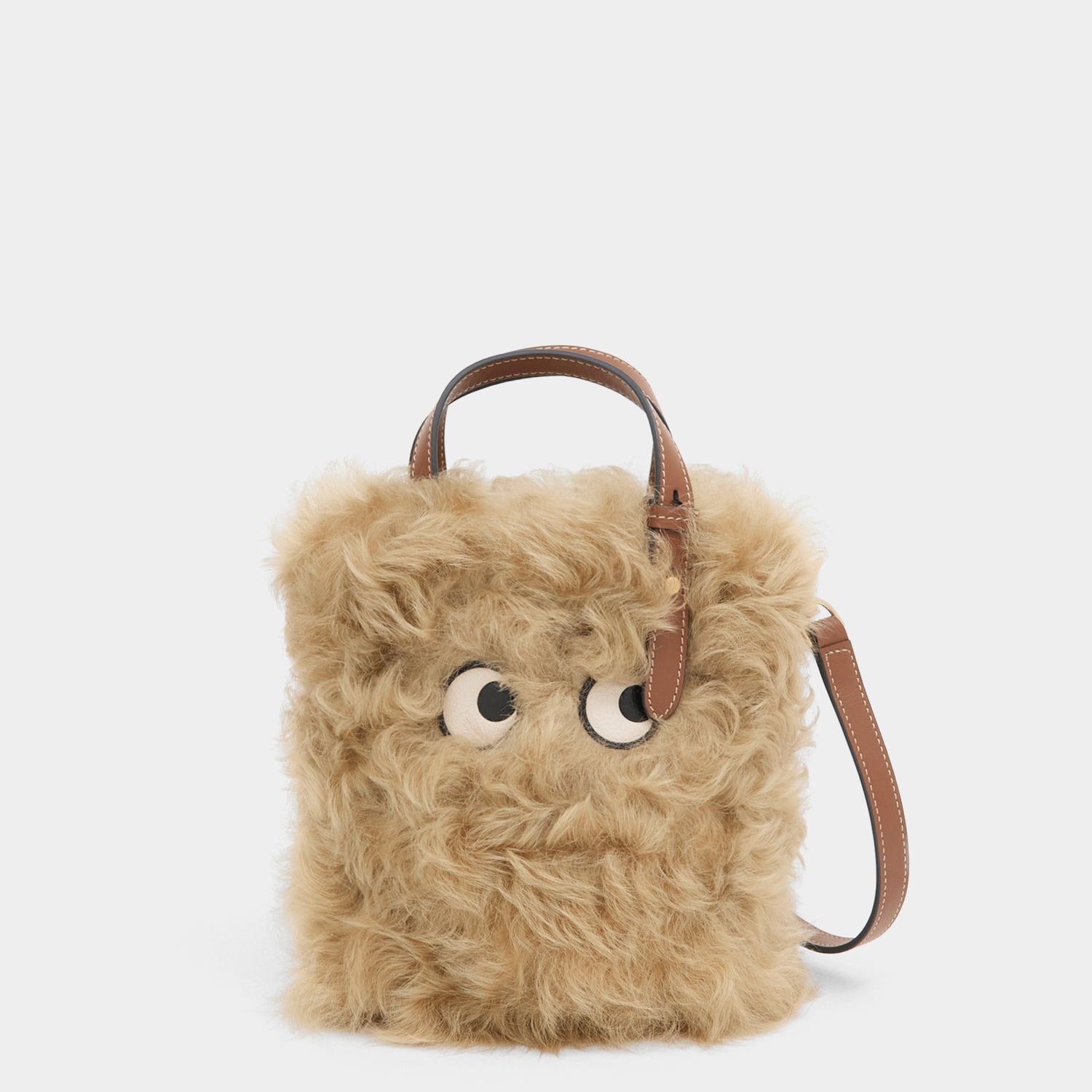 N/S Mini Eyes Shearling Tote -

          
            Shearling/Smooth Leather in Taupe -
          

          Anya Hindmarch US
