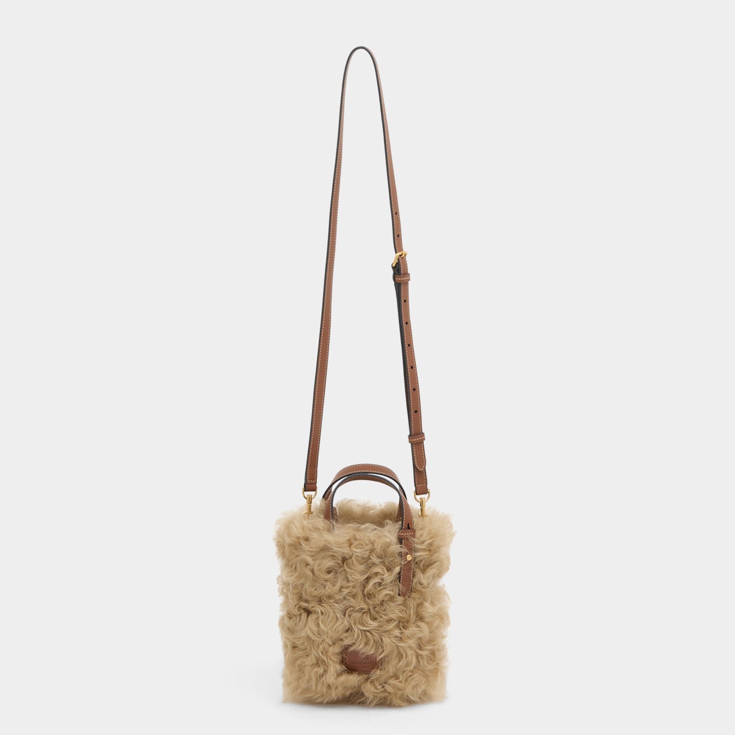 N/S Mini Eyes Shearling Tote -

          
            Shearling/Smooth Leather in Taupe -
          

          Anya Hindmarch US
