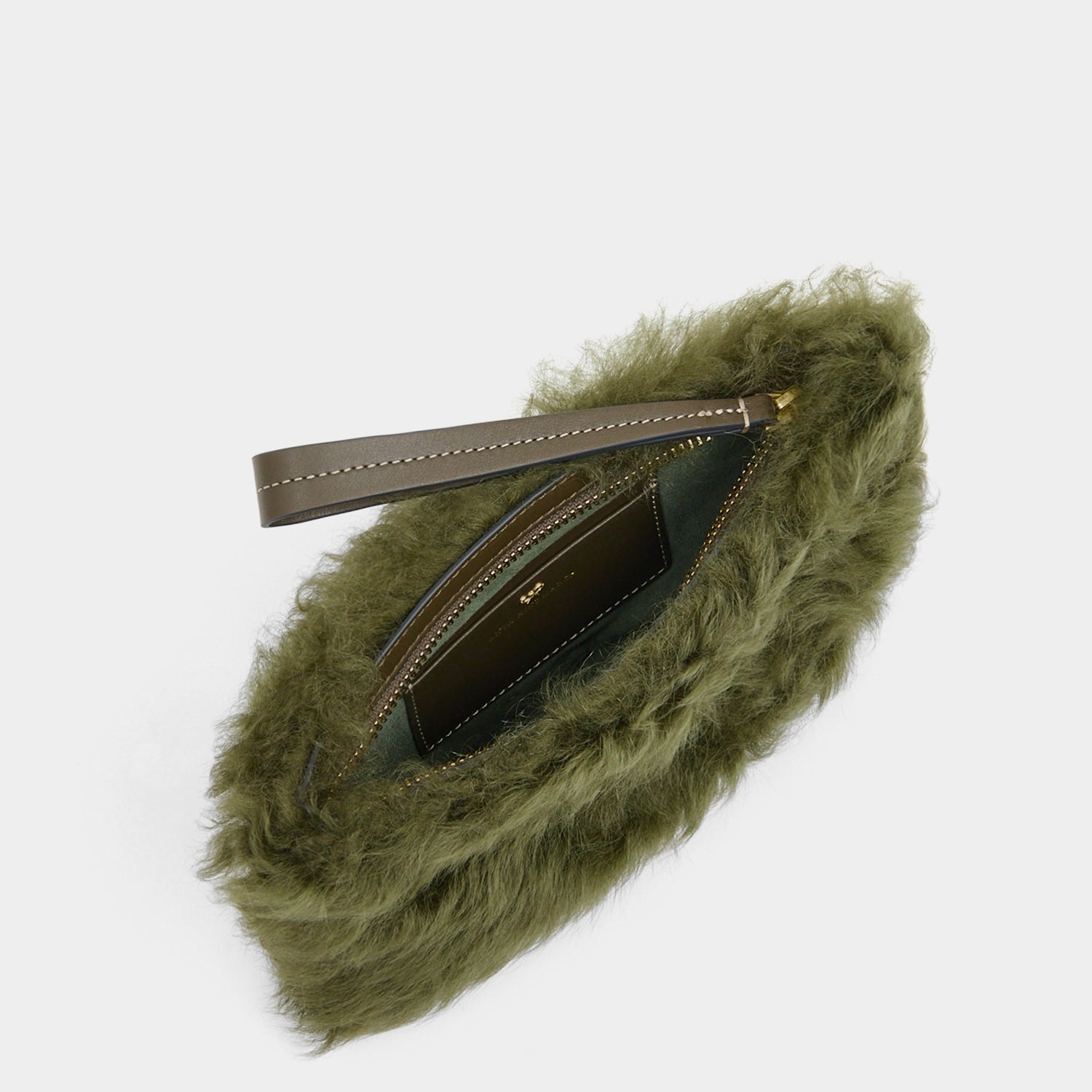Shearling Eyes Clutch -

          
            Shearling/Smooth Leather in Khaki Green -
          

          Anya Hindmarch US
