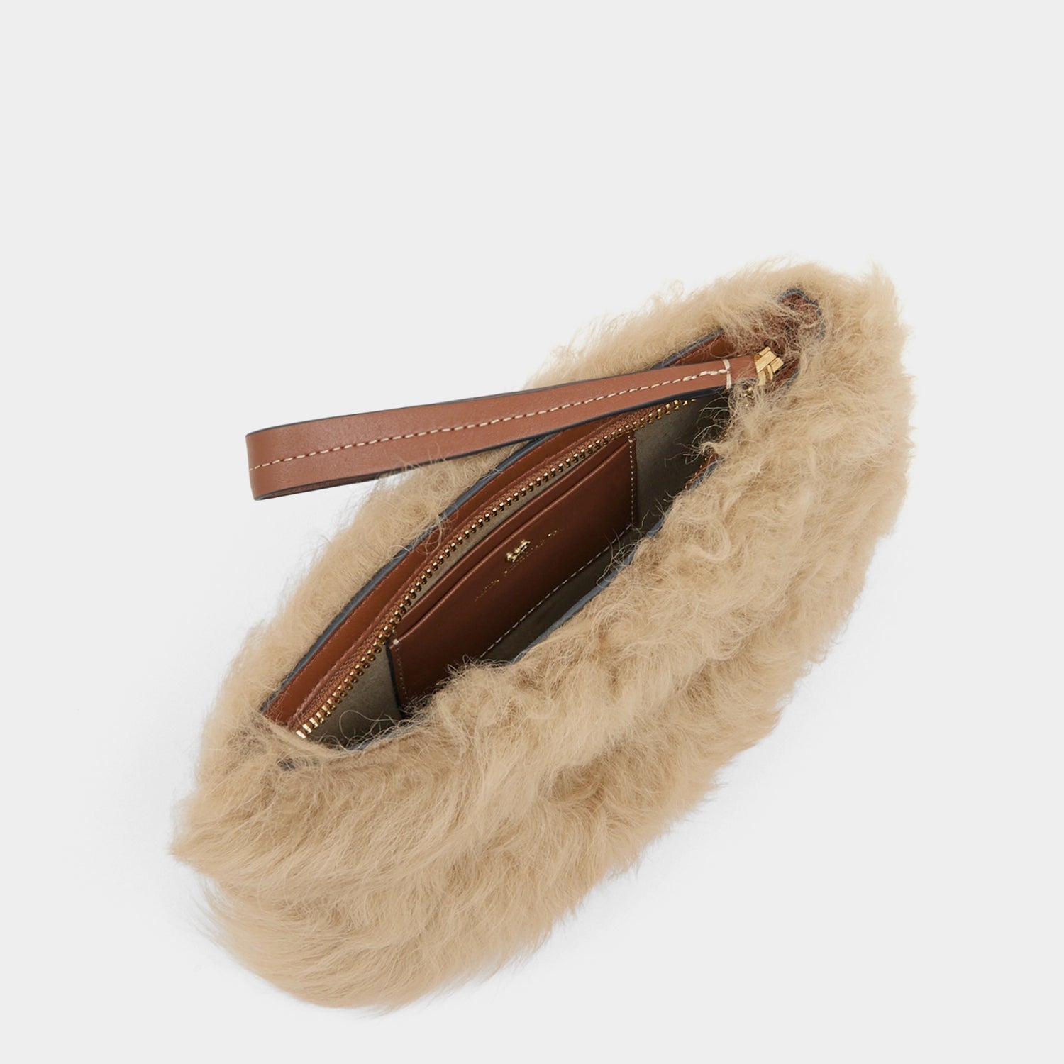 Shearling Eyes Clutch -

          
            Shearling/Smooth Leather leather in Taupe -
          

          Anya Hindmarch US
