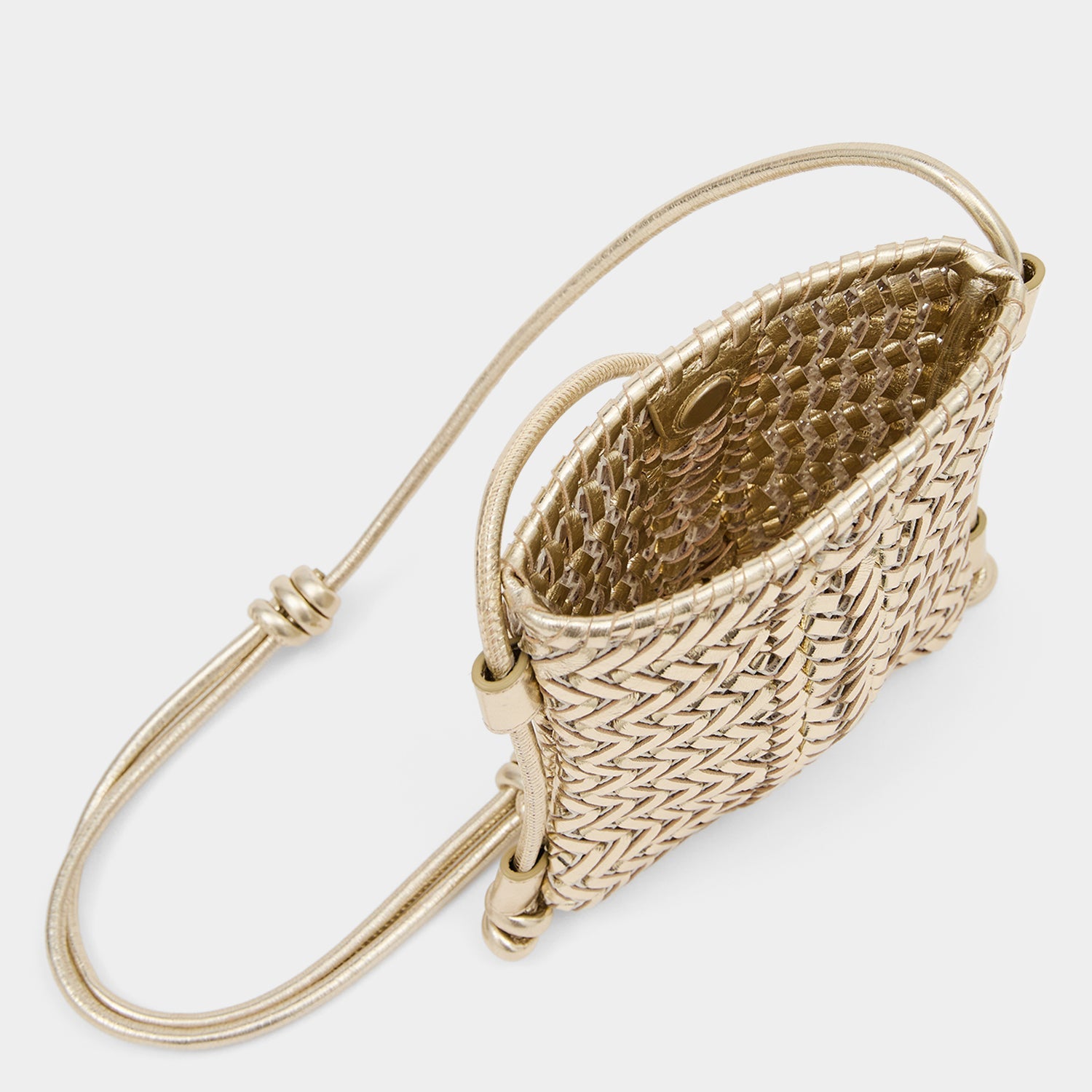 Platinum handwoven leather crossbody pouch by Anya Hindmarch