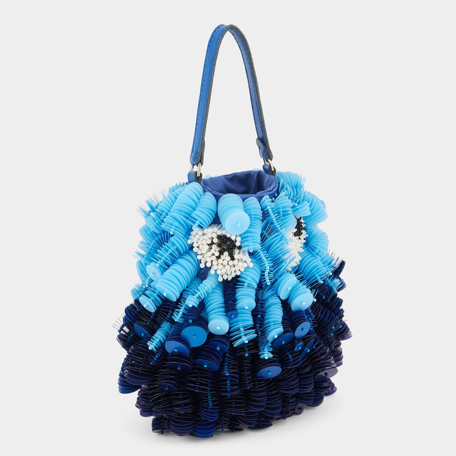 Blue beaded crossbody bag shaped like a fish by Anya Hindmarch
