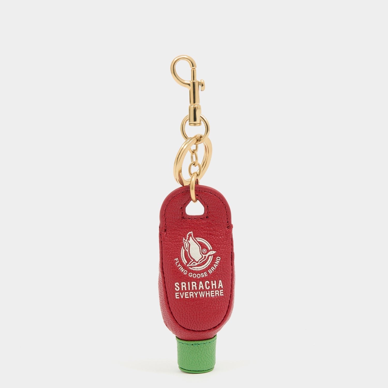 Anya Brands Flying Goose Sriracha Charm -

          
            Smooth Leather in Russet Red -
          

          Anya Hindmarch US
