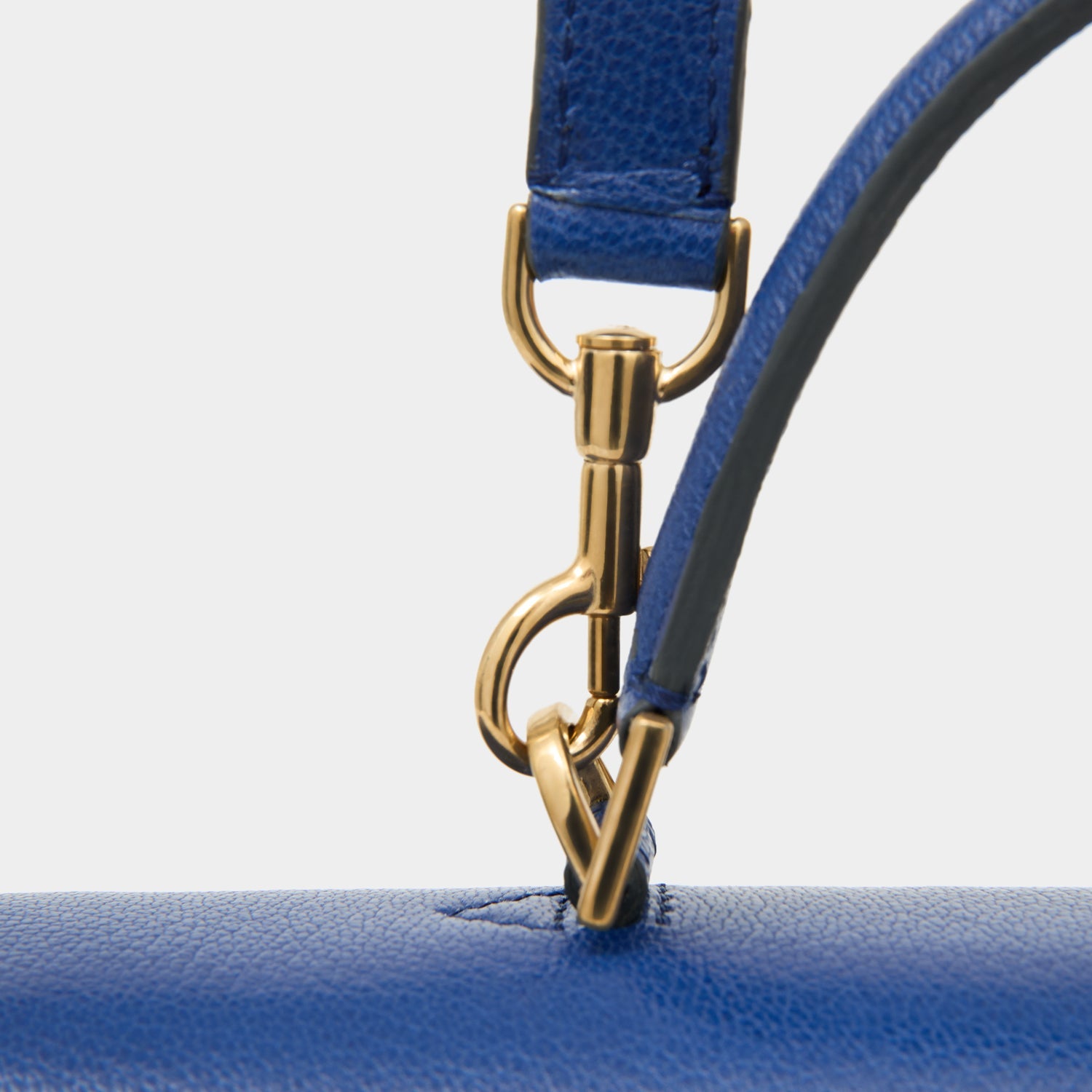 Peanuts Snoopy Mortimer Top Handle -

          
            Capra Leather in Monday Blue -
          

          Anya Hindmarch US
