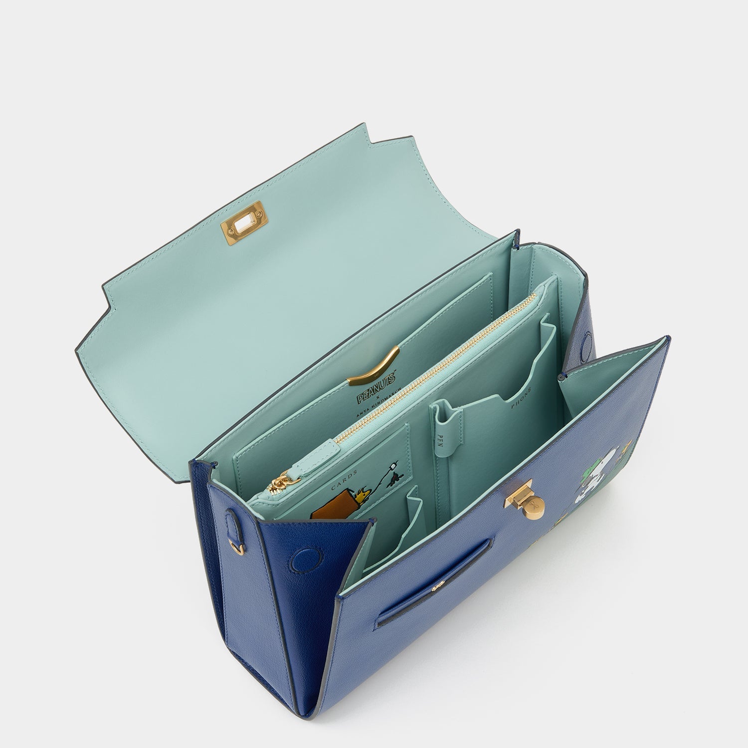 Peanuts Snoopy Mortimer Top Handle -

          
            Capra Leather in Monday Blue -
          

          Anya Hindmarch US
