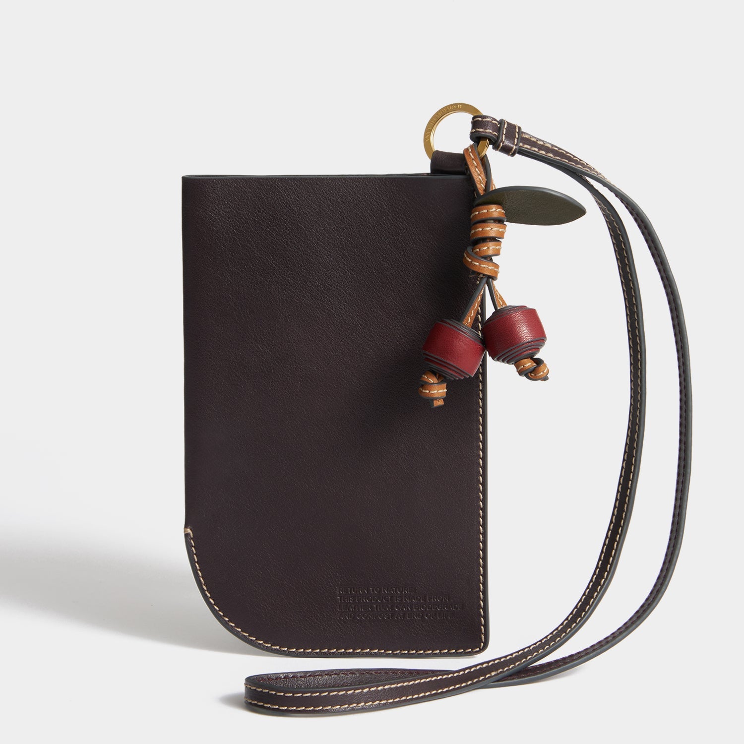 Return To Nature Strap Phone Pouch -

          
            Natural Grain Leather in Grape -
          

          Anya Hindmarch US
