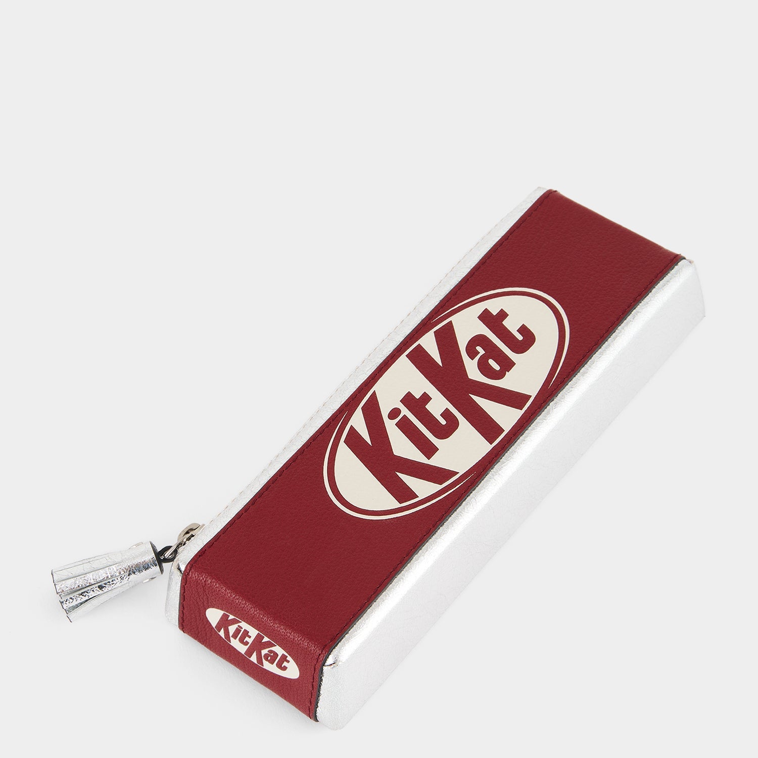 Anya Brands Kit Kat Pencil Case -

          
            Calf Leather in Red and Metallic Silver -
          

          Anya Hindmarch US

