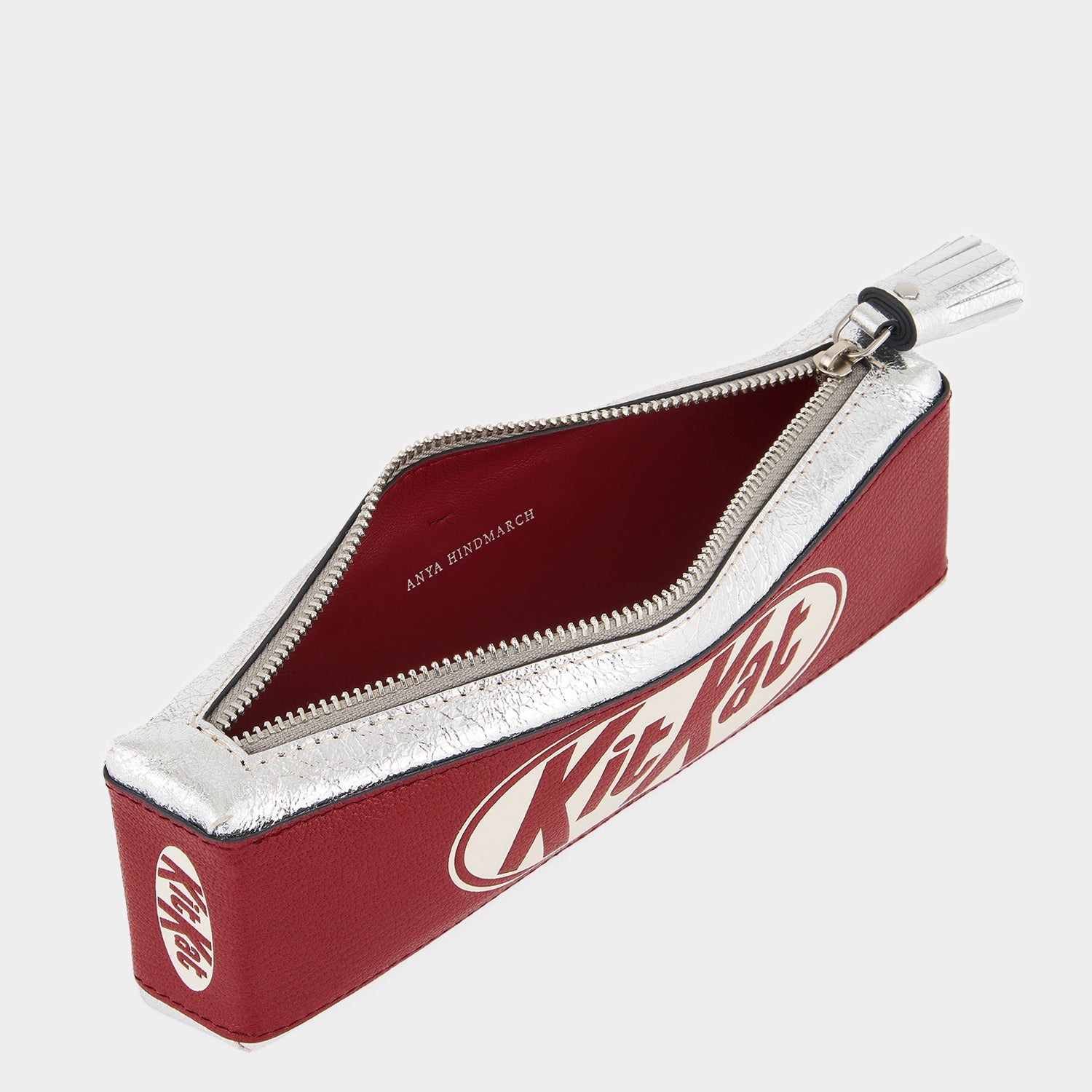 Anya Brands Kit Kat Pencil Case -

          
            Calf Leather in Red and Metallic Silver -
          

          Anya Hindmarch US
