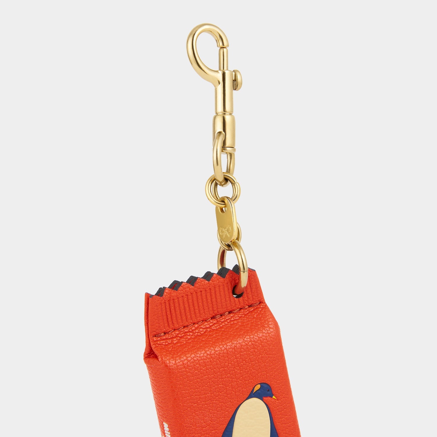Anya Brands McVitie's Penguin Charm -

          
            Calf Leather in Flag Red -
          

          Anya Hindmarch US
