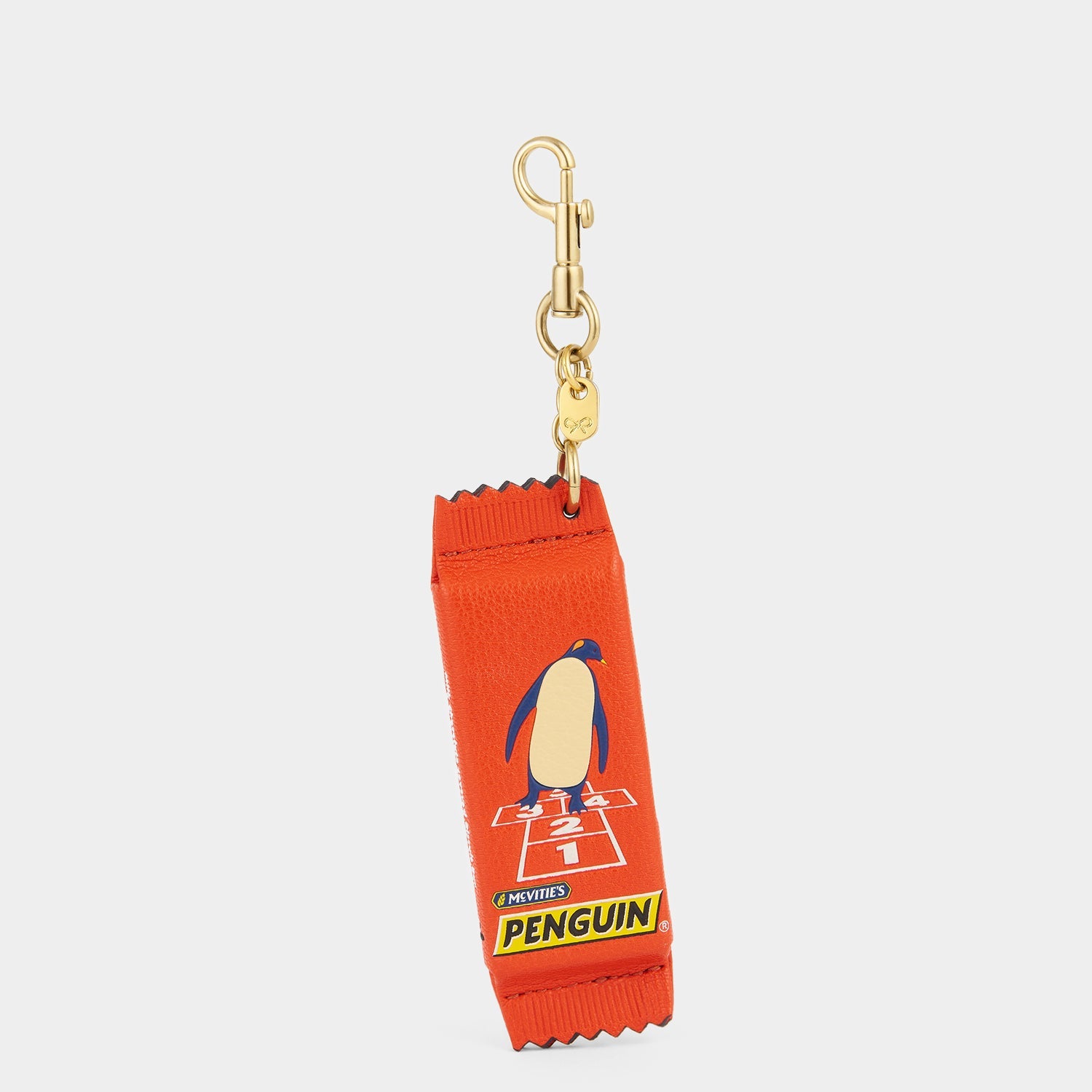 Anya Brands McVitie's Penguin Charm -

          
            Calf Leather in Flag Red -
          

          Anya Hindmarch US
