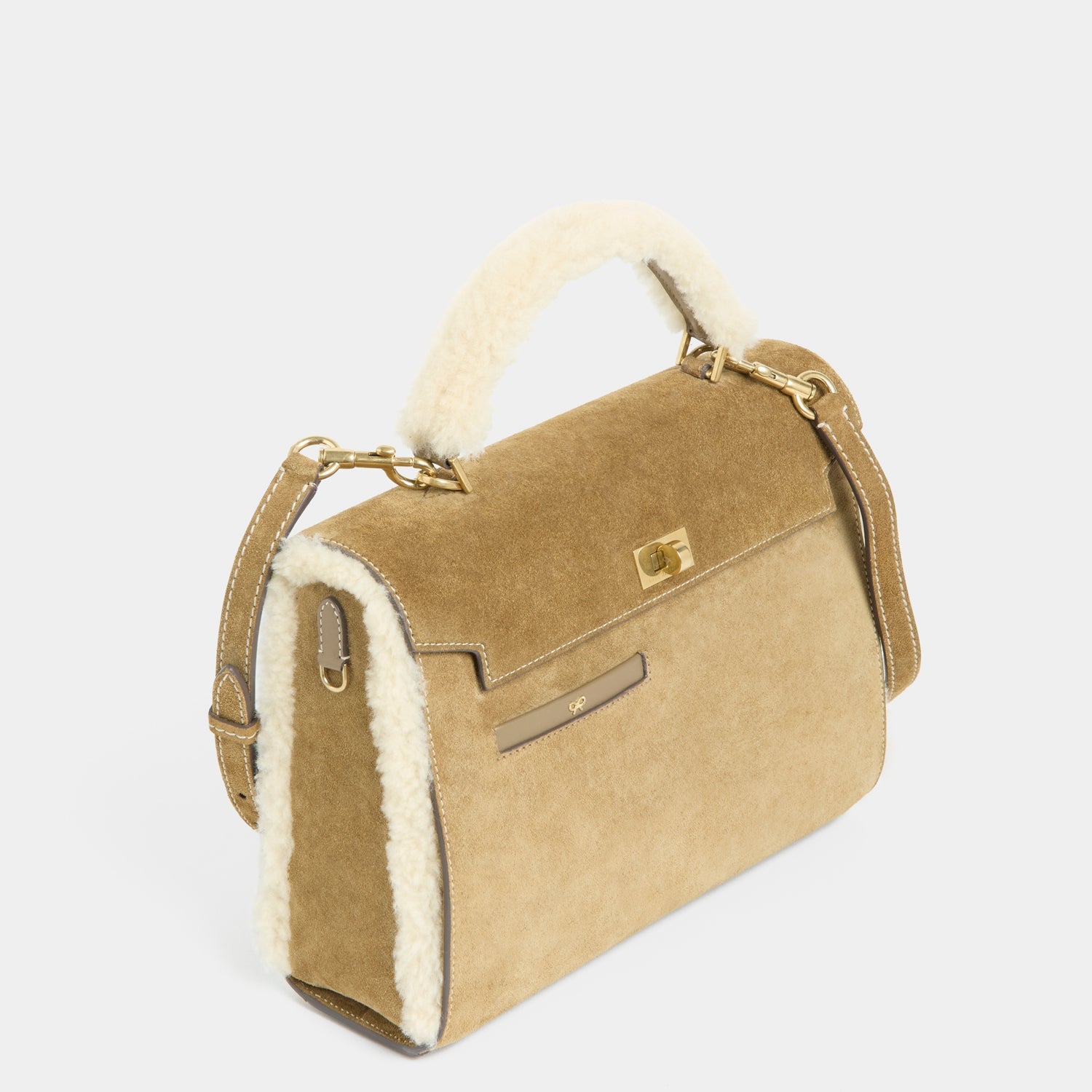 Mortimer Shearling Top Handle -

          
            Shearling/Suede Leather in Moutarde -
          

          Anya Hindmarch US
