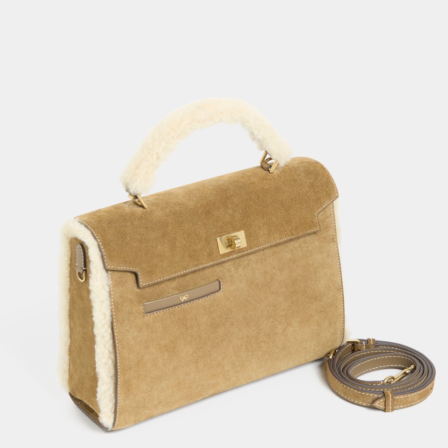 Mortimer Shearling Top Handle -

          
            Shearling/Suede Leather in Moutarde -
          

          Anya Hindmarch US
