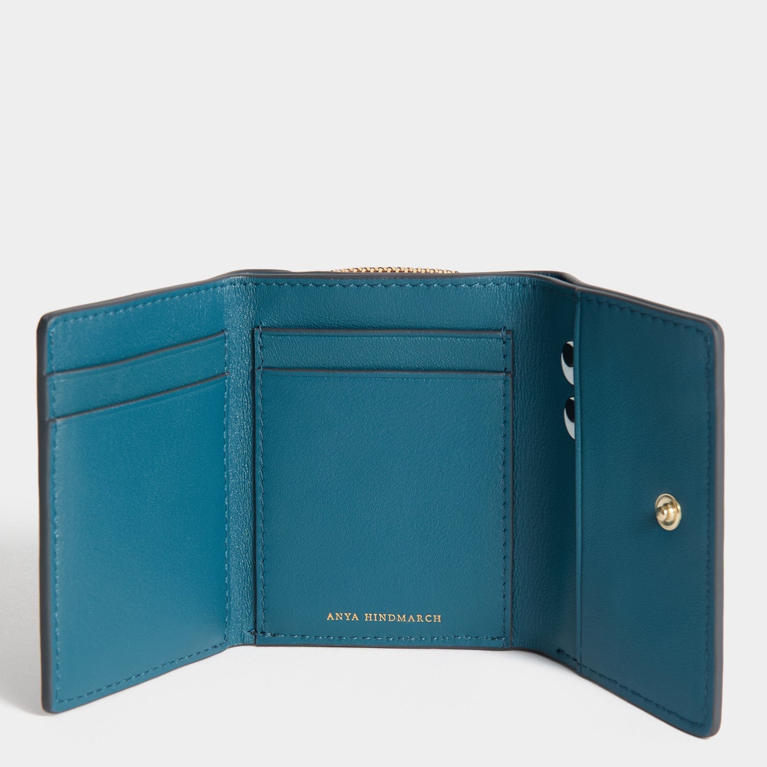 Peeping Eyes Mini Trifold Wallet -

          
            Capra Leather in Claret -
          

          Anya Hindmarch US
