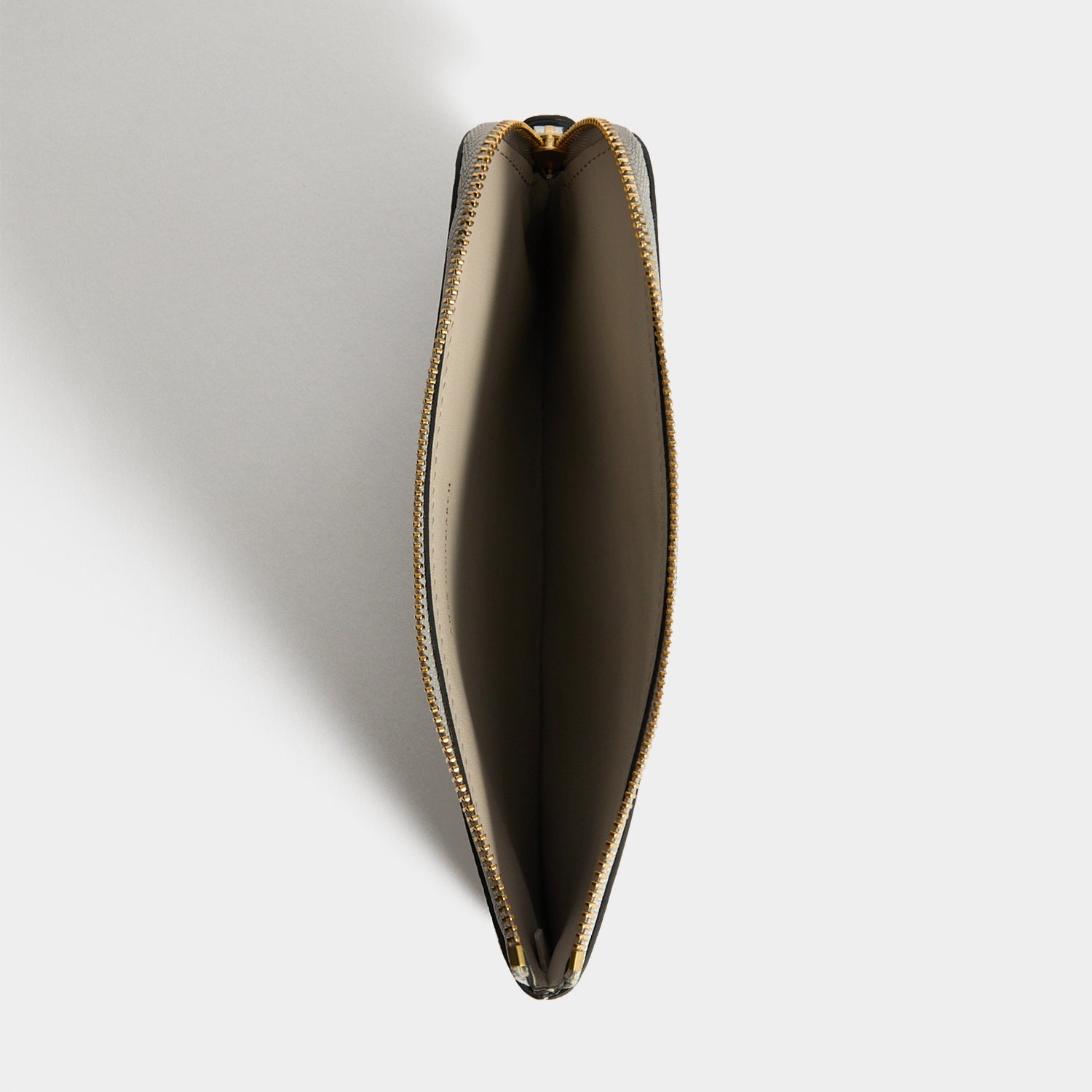 Anya Brands BAND-AID® Brand Zip Loose Pocket -

          
            Capra Leather in Silver -
          

          Anya Hindmarch US
