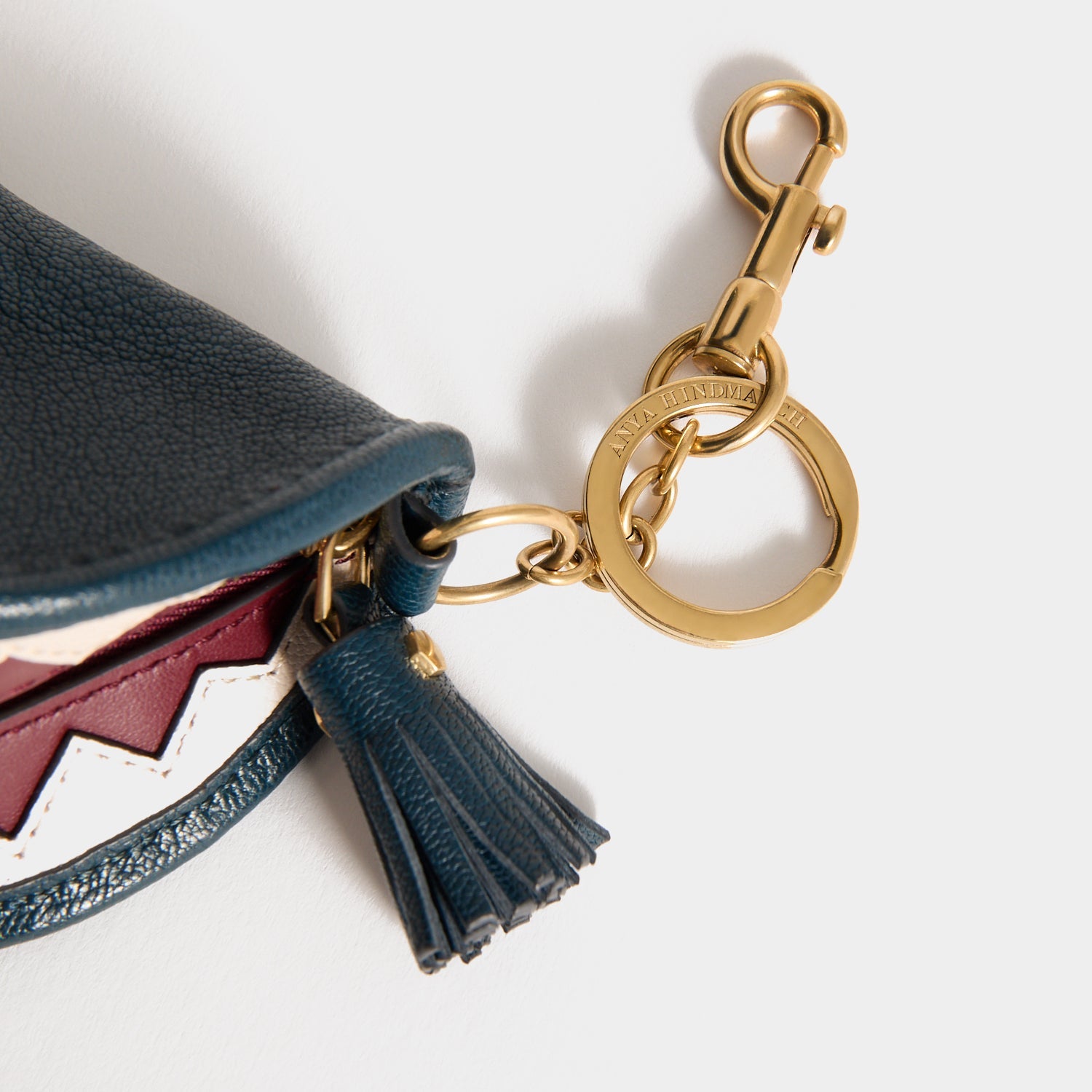Shark Teeth Ear Pods Pouch Charm -

          
            Capra Leather in Petrol Blue -
          

          Anya Hindmarch US
