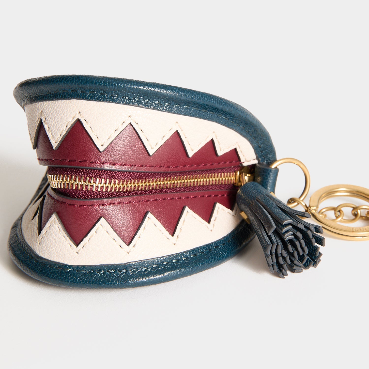 Shark Teeth Ear Pods Pouch Charm -

          
            Capra Leather in Petrol Blue -
          

          Anya Hindmarch US
