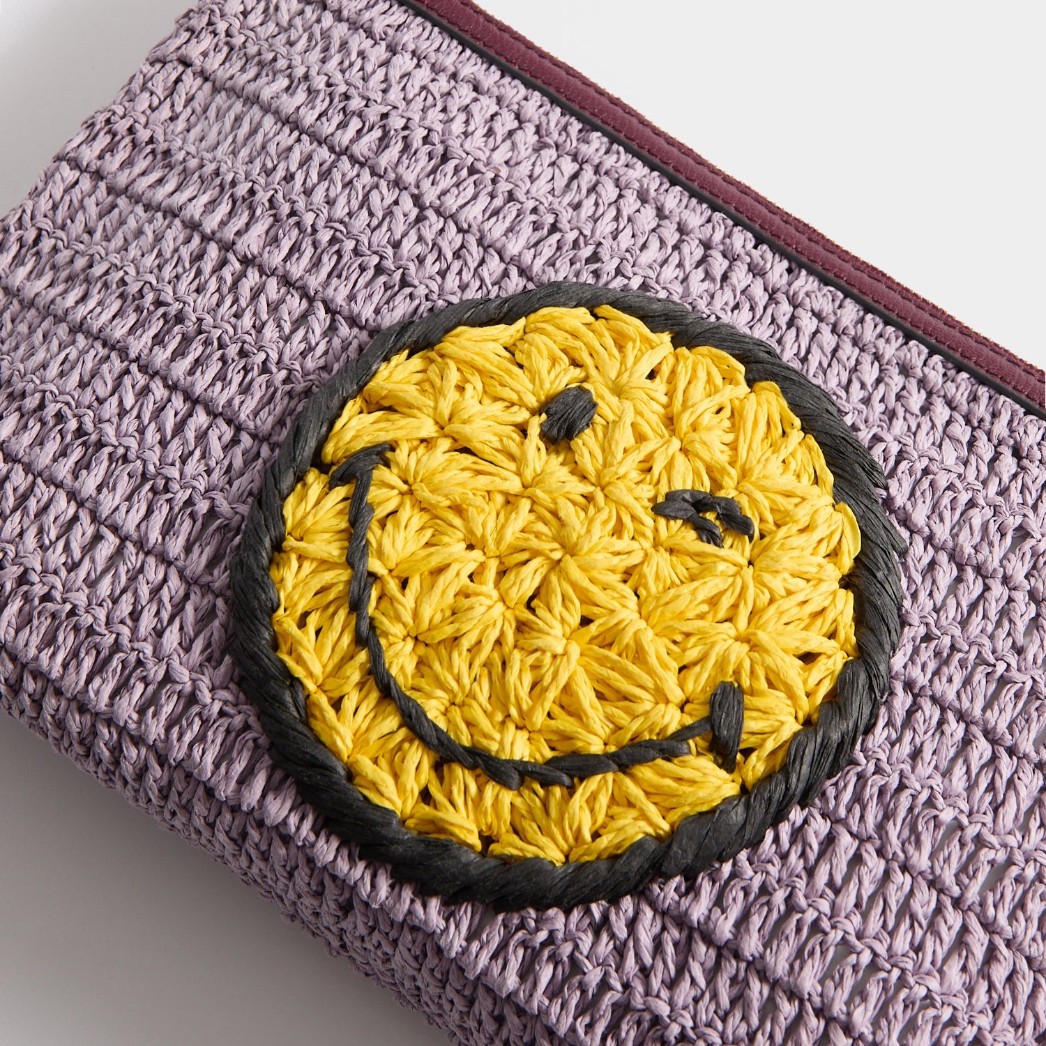 ANYA HINDMARCH / ネオンイエロー スマイルクラッチバッグ Raffia Wink Pochette | Anya Hindmarch US