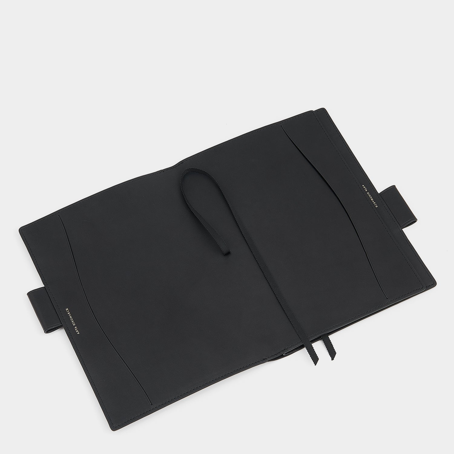 Bespoke A6 Two Way Journal -

                  
                    Butter Leather in Black -
                  

                  Anya Hindmarch US

