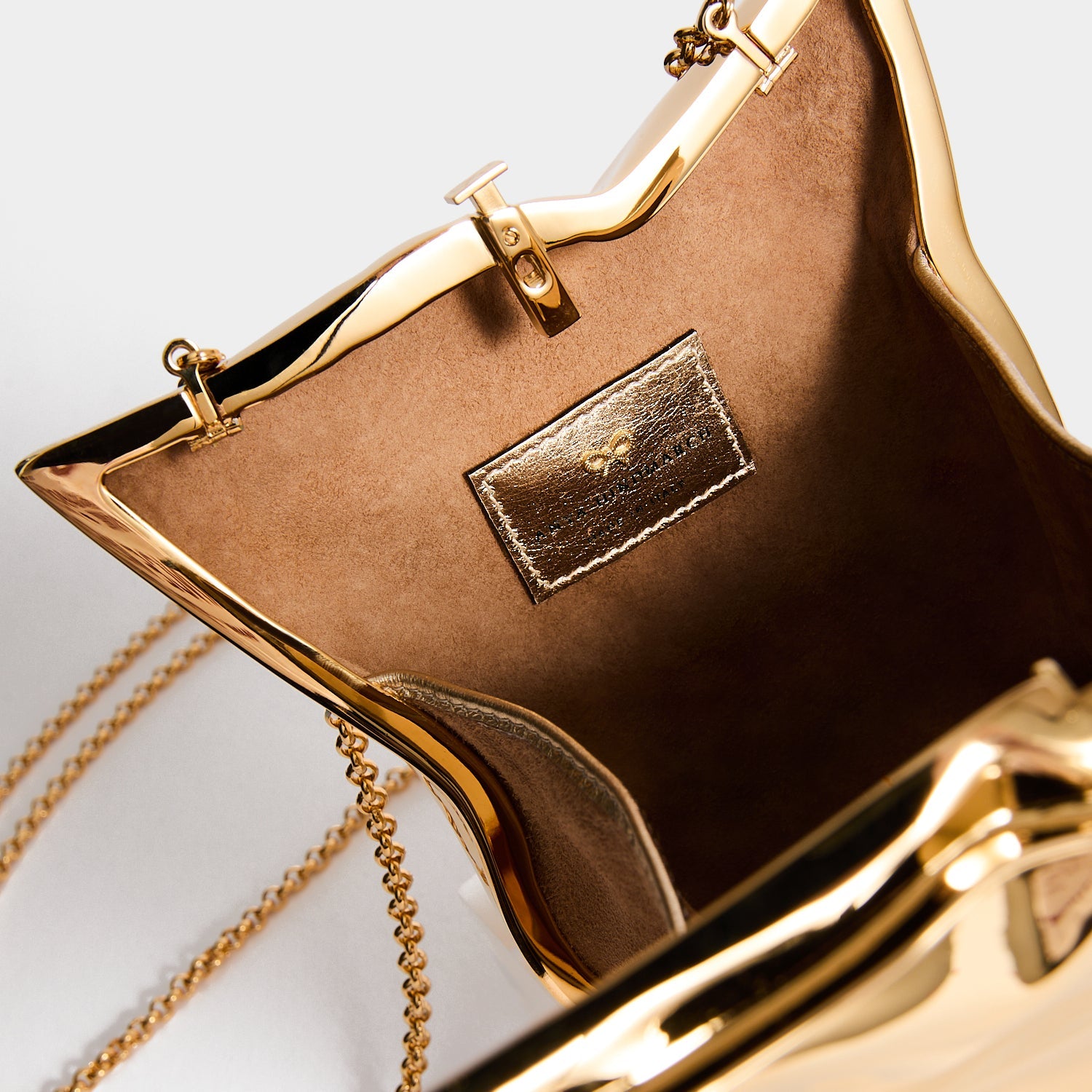 ANYA HINDMARCH ゴールド ケース　財布 Crisp Packet Clutch Bag in Gold Metal | Anya Hindmarch US