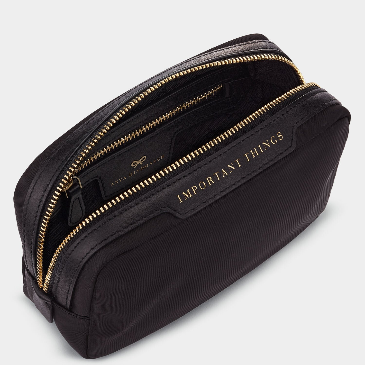 Important Things Pouch -

          
            Econyl® Regenerated Nylon in Black -
          

          Anya Hindmarch US
