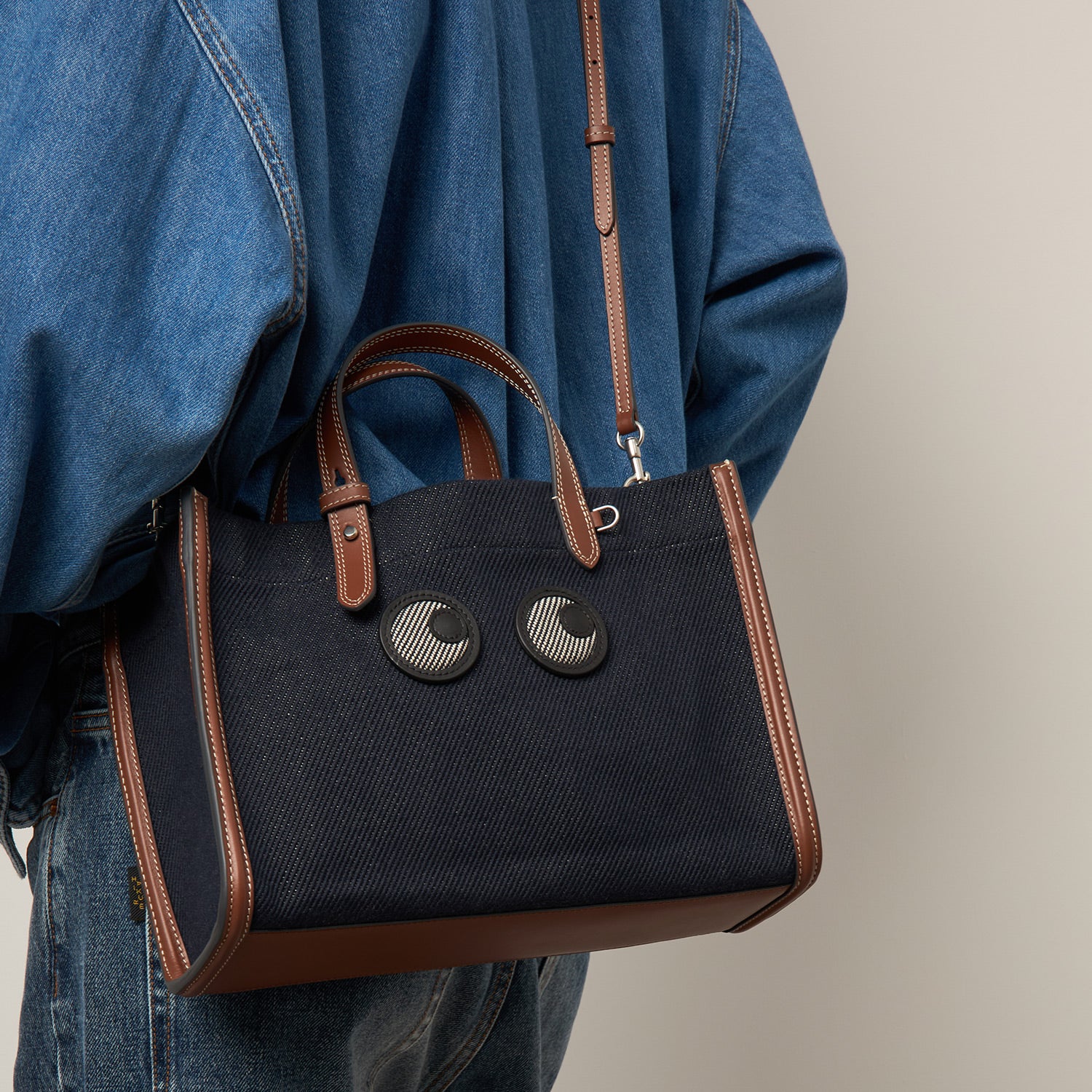 Mini E/W Eyes Tote -

          
            Cotton Drill in Navy -
          

          Anya Hindmarch US
