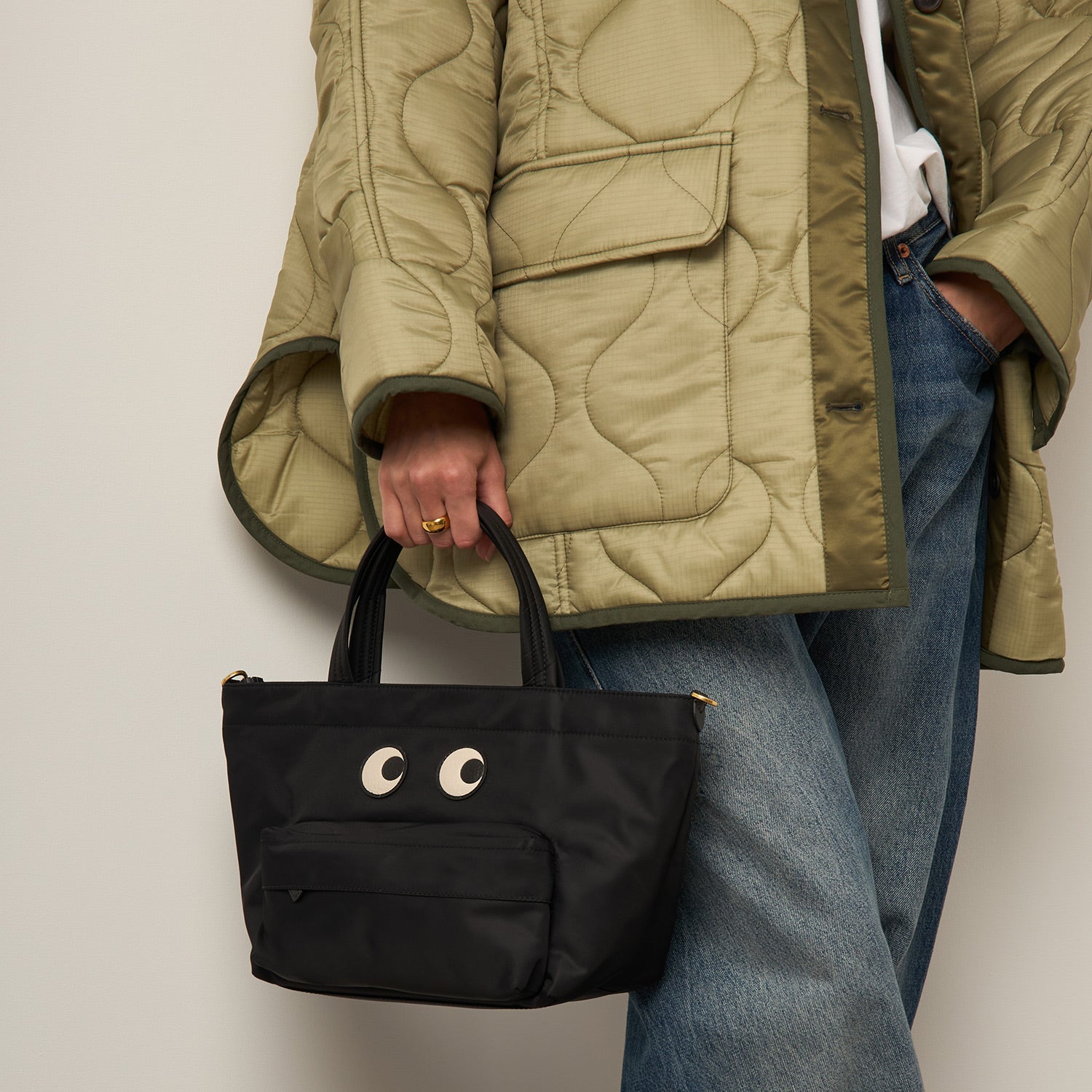 E/W Eyes Mini Cross-body Tote -

          
            Regenerated ECONYL® in Black -
          

          Anya Hindmarch US
