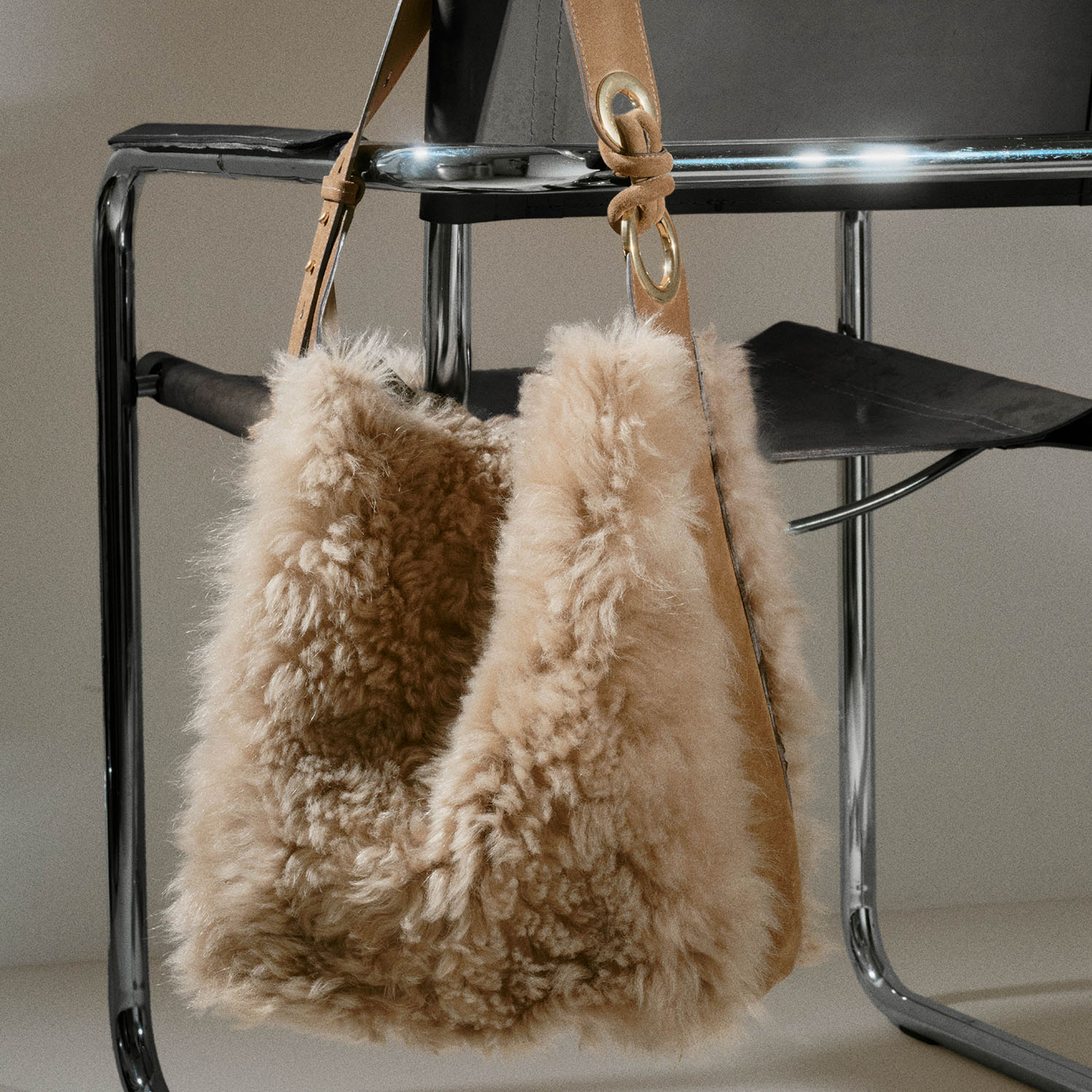 Ringo Shearling Shoulder Bag -

          
            Shearling in Taupe -
          

          Anya Hindmarch US
