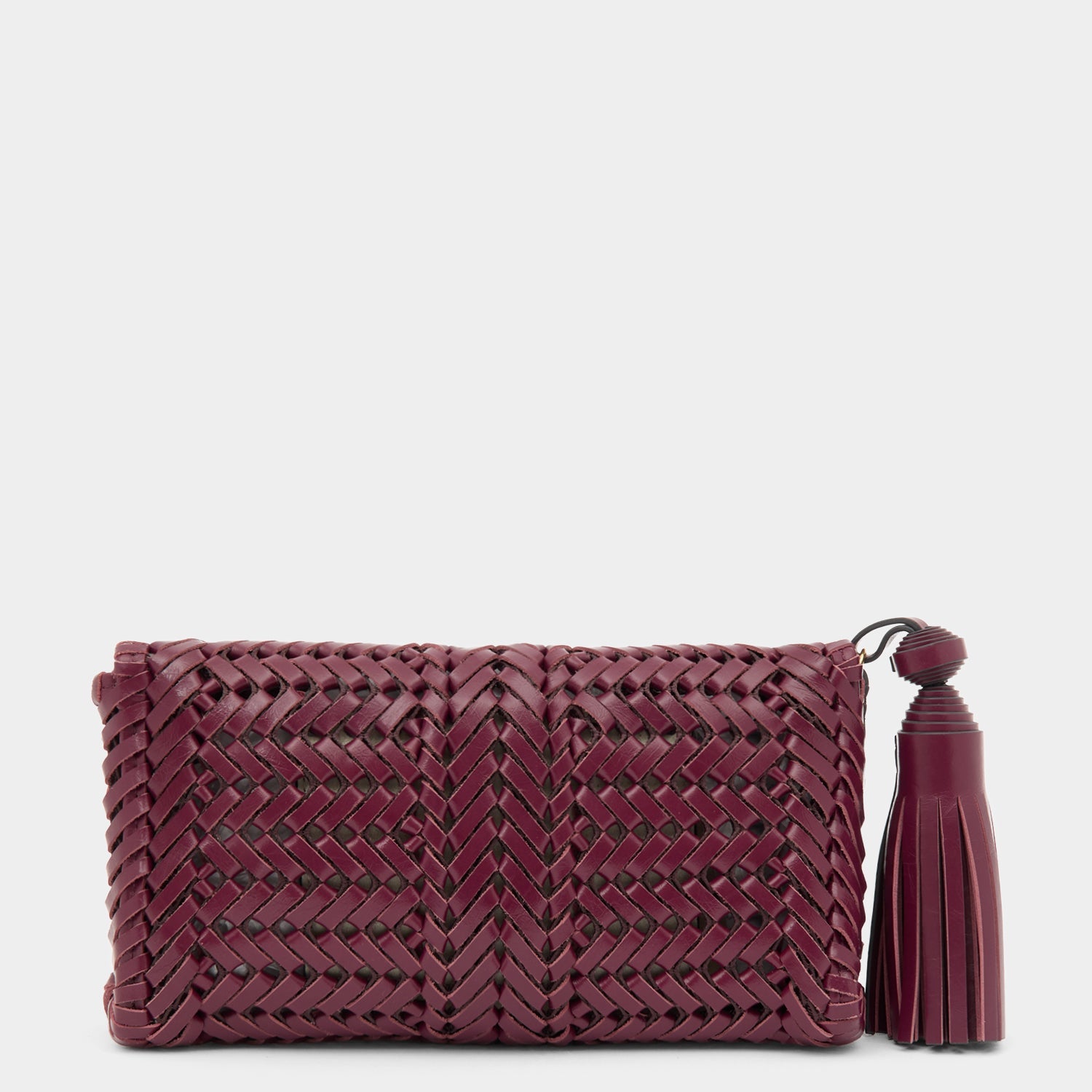 Handwoven leather clutch with adjustable strap by Anya Hindmarch