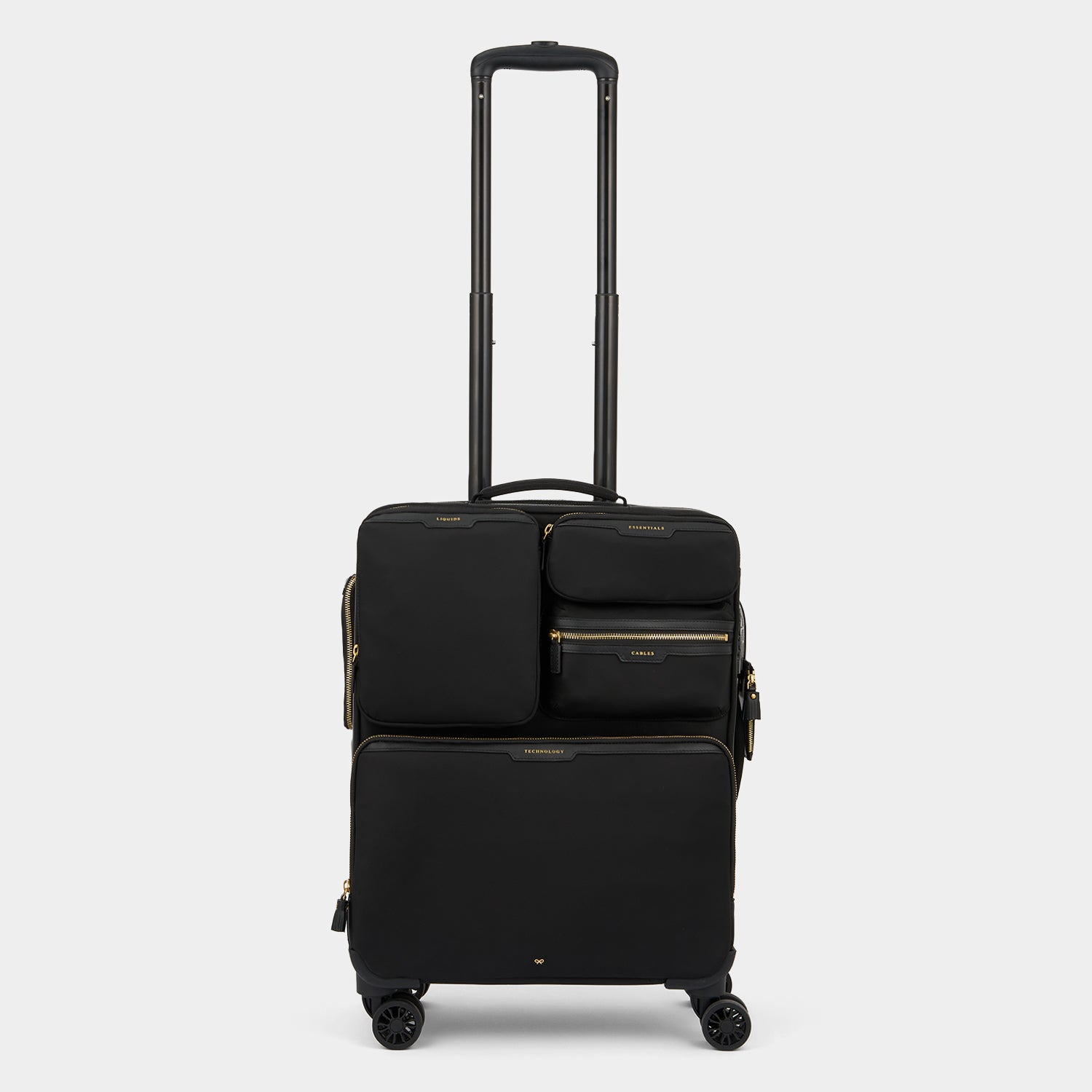 Short-Haul Suitcase -

                  
                    Econyl® Regenerated Nylon in Black -
                  

                  Anya Hindmarch US
