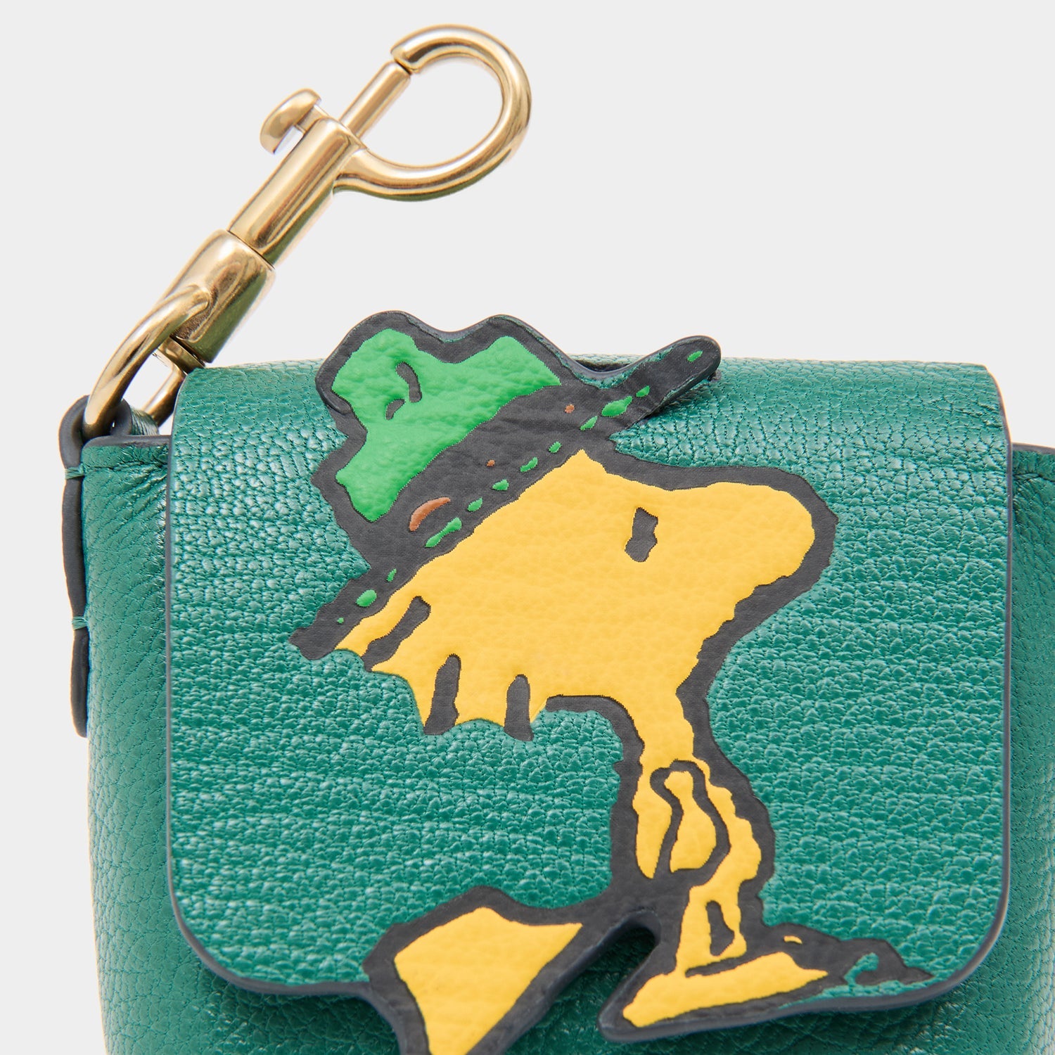 Peanuts Woodstock Ear Pods Pouch -

          
            Capra Leather in Yellow -
          

          Anya Hindmarch US
