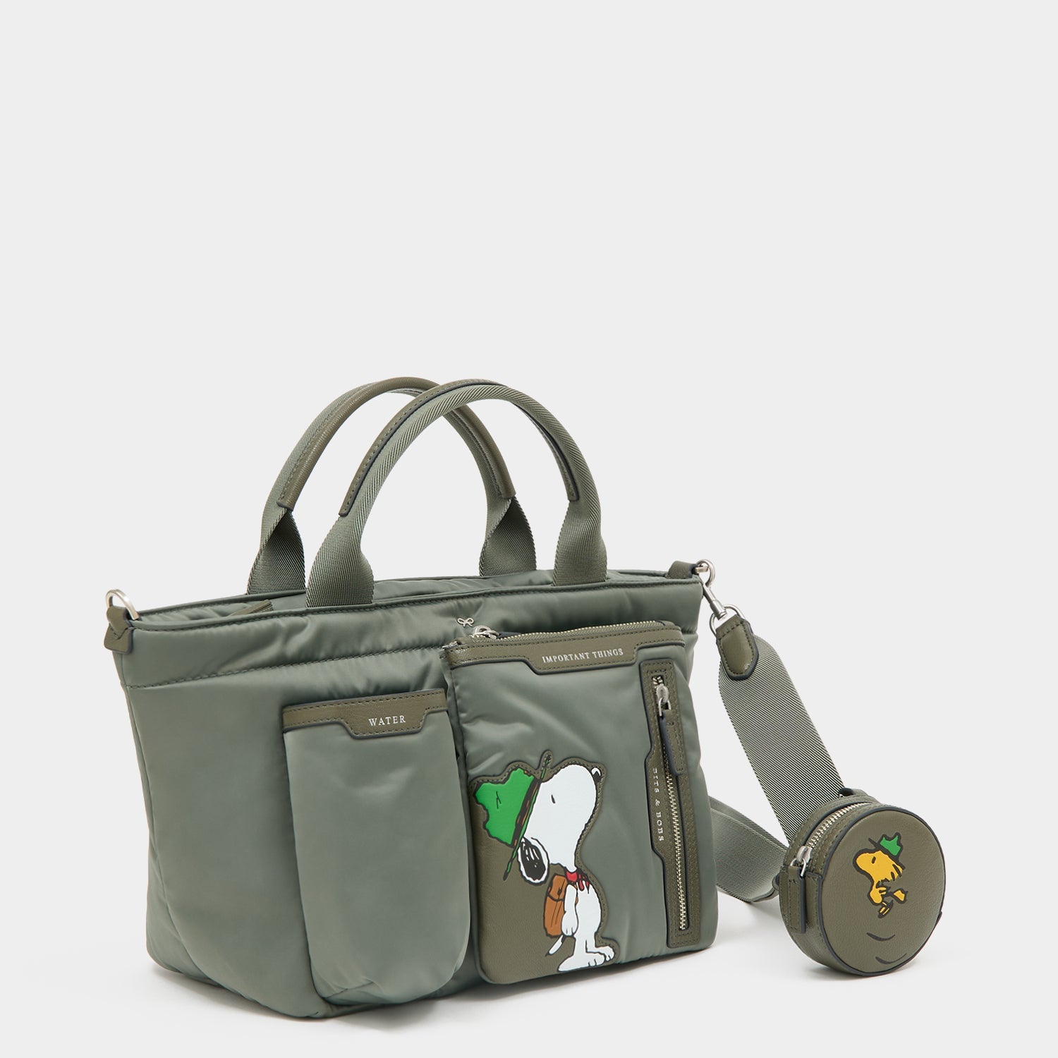 Peanuts Snoopy E/W Mini Tote -

          
            Recycled padded fabric in Fern Green -
          

          Anya Hindmarch US
