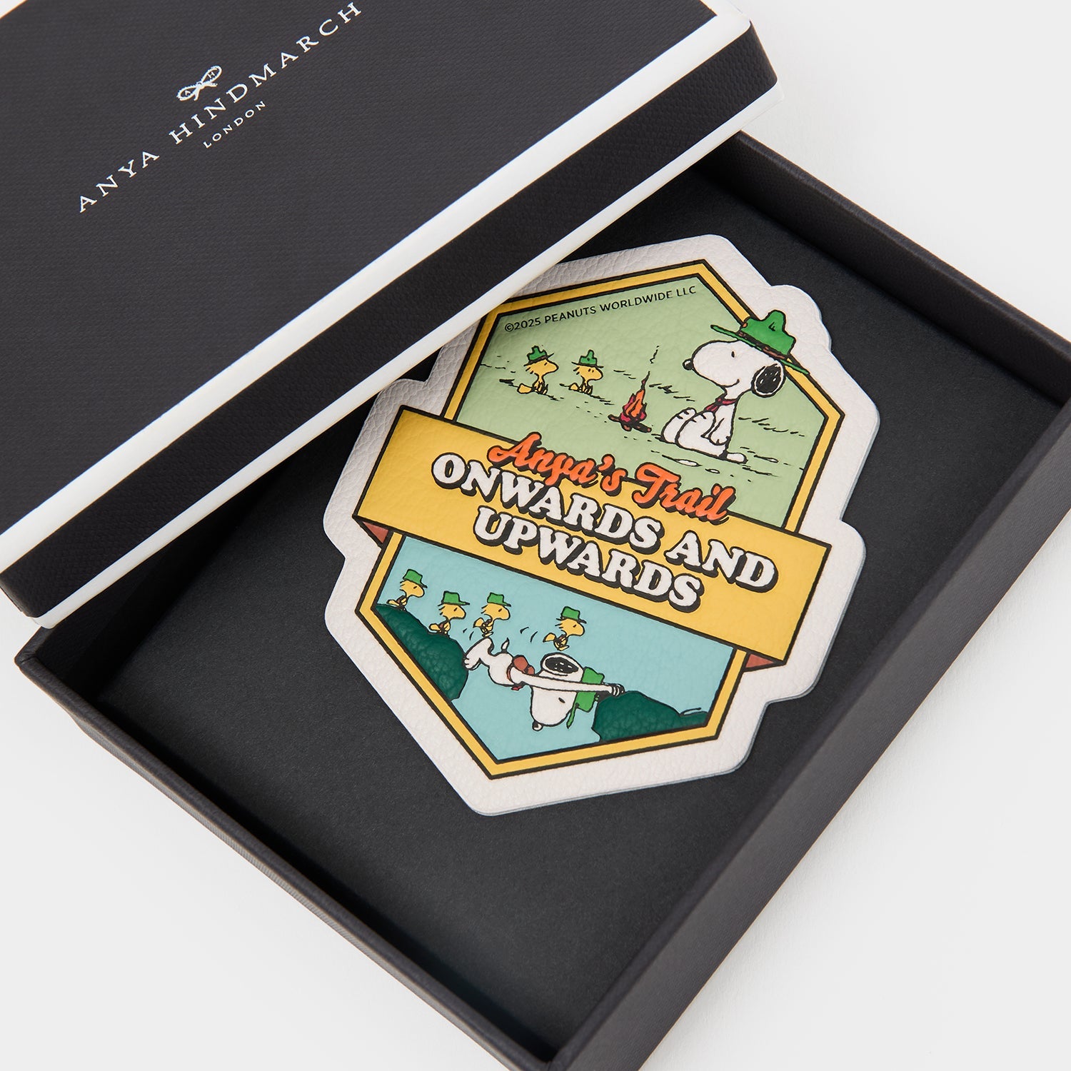 Peanuts Snoopy Sticker -

          
            Capra Leather in Optic White -
          

          Anya Hindmarch US
