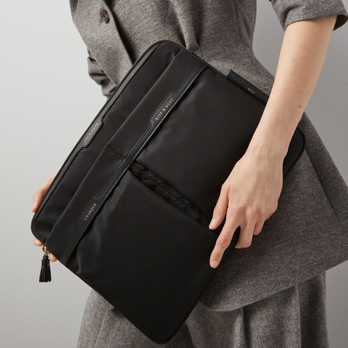 Technology Case -

          
            Econyl® Regenerated Nylon in Black -
          

          Anya Hindmarch US
