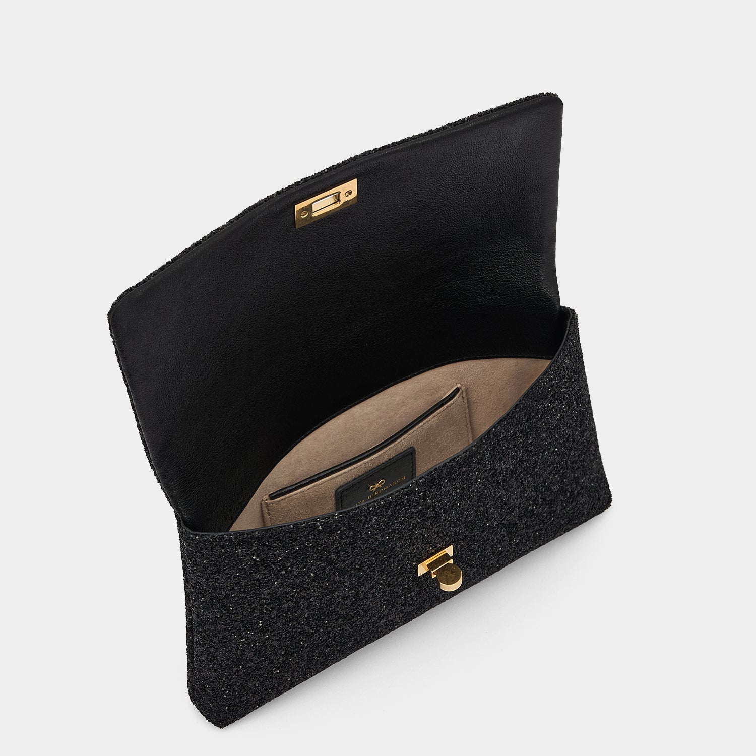 Valorie Clutch -

          
            Glitter in Black -
          

          Anya Hindmarch US
