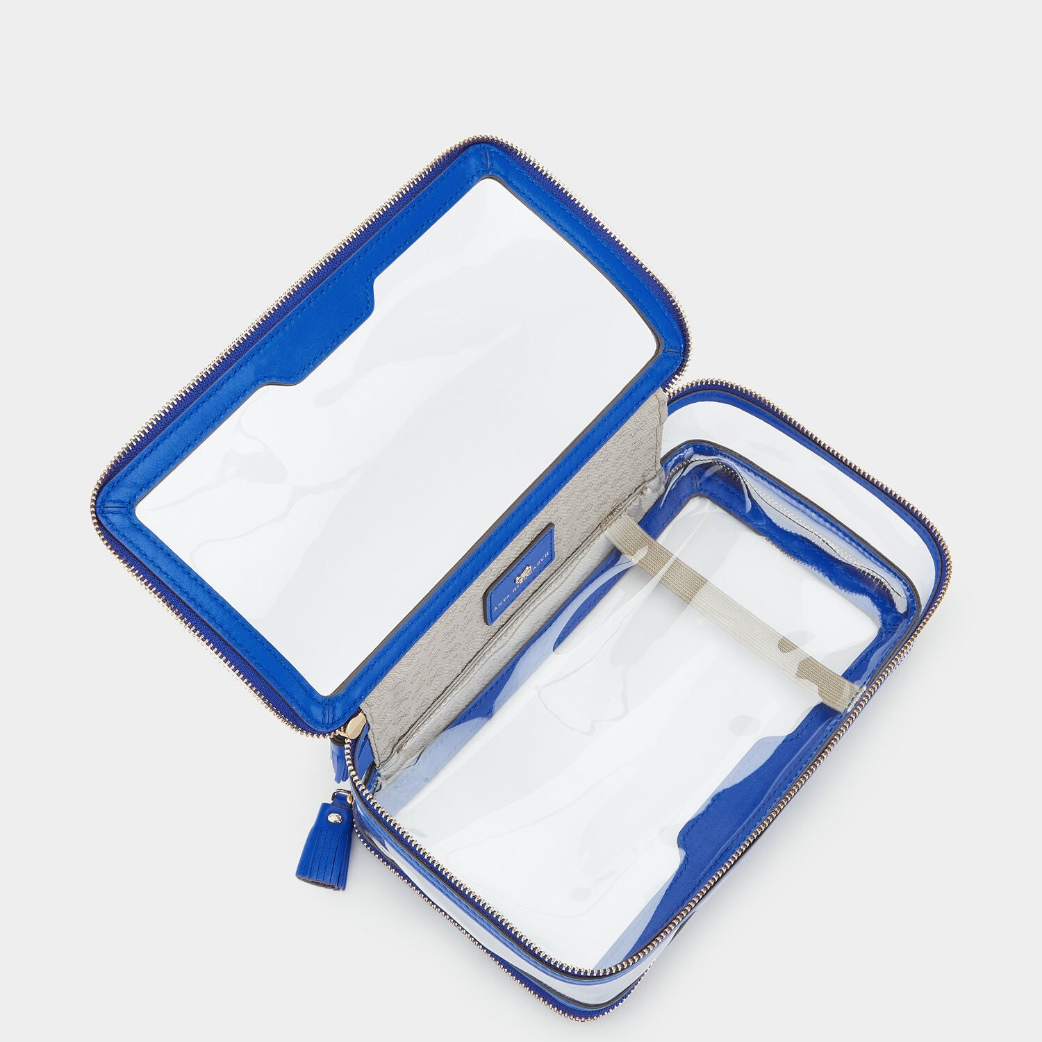 In-Flight Case -

                  
                    Circus Leather in Electric Blue -
                  

                  Anya Hindmarch US
