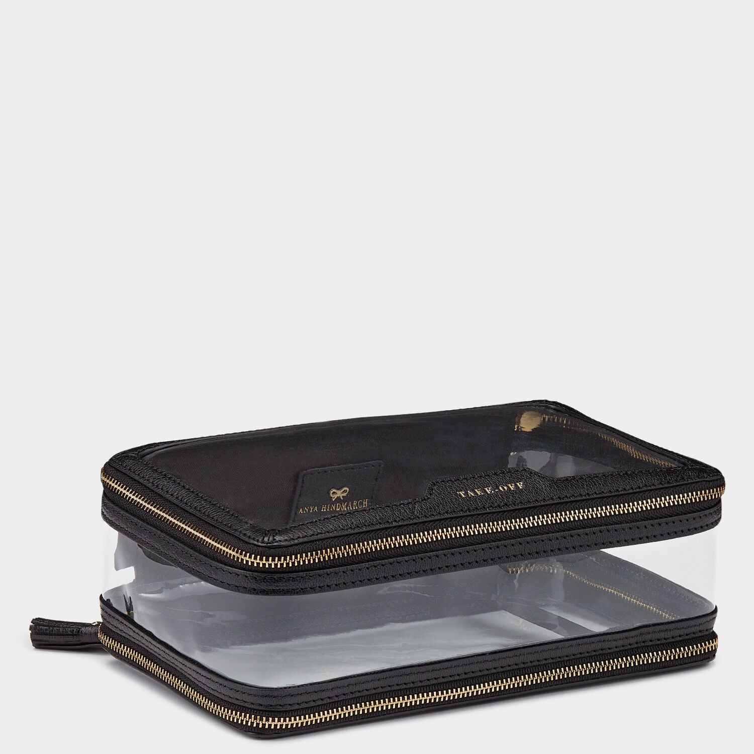 In-Flight Case -

          
            Capra in Black -
          

          Anya Hindmarch US
