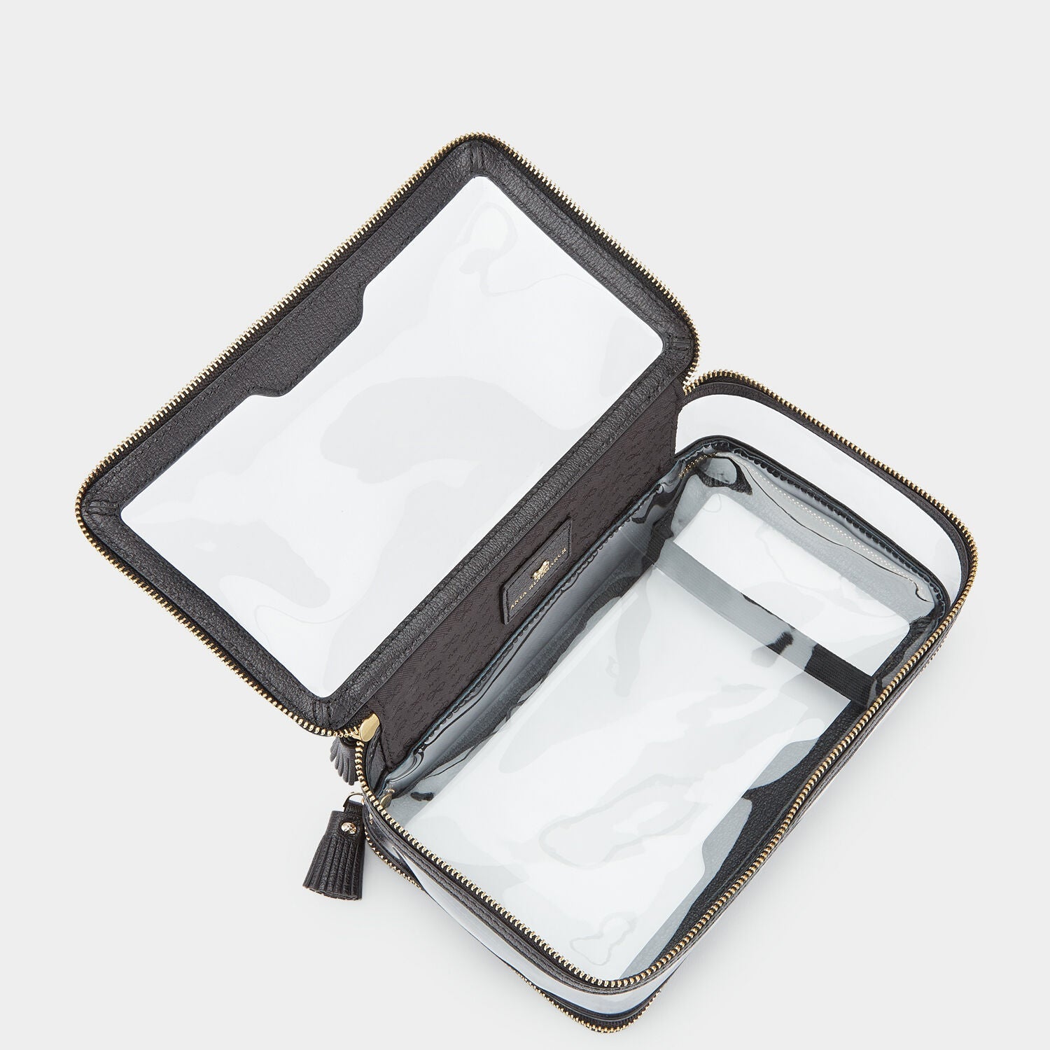 In-Flight Case -

          
            Capra in Black -
          

          Anya Hindmarch US
