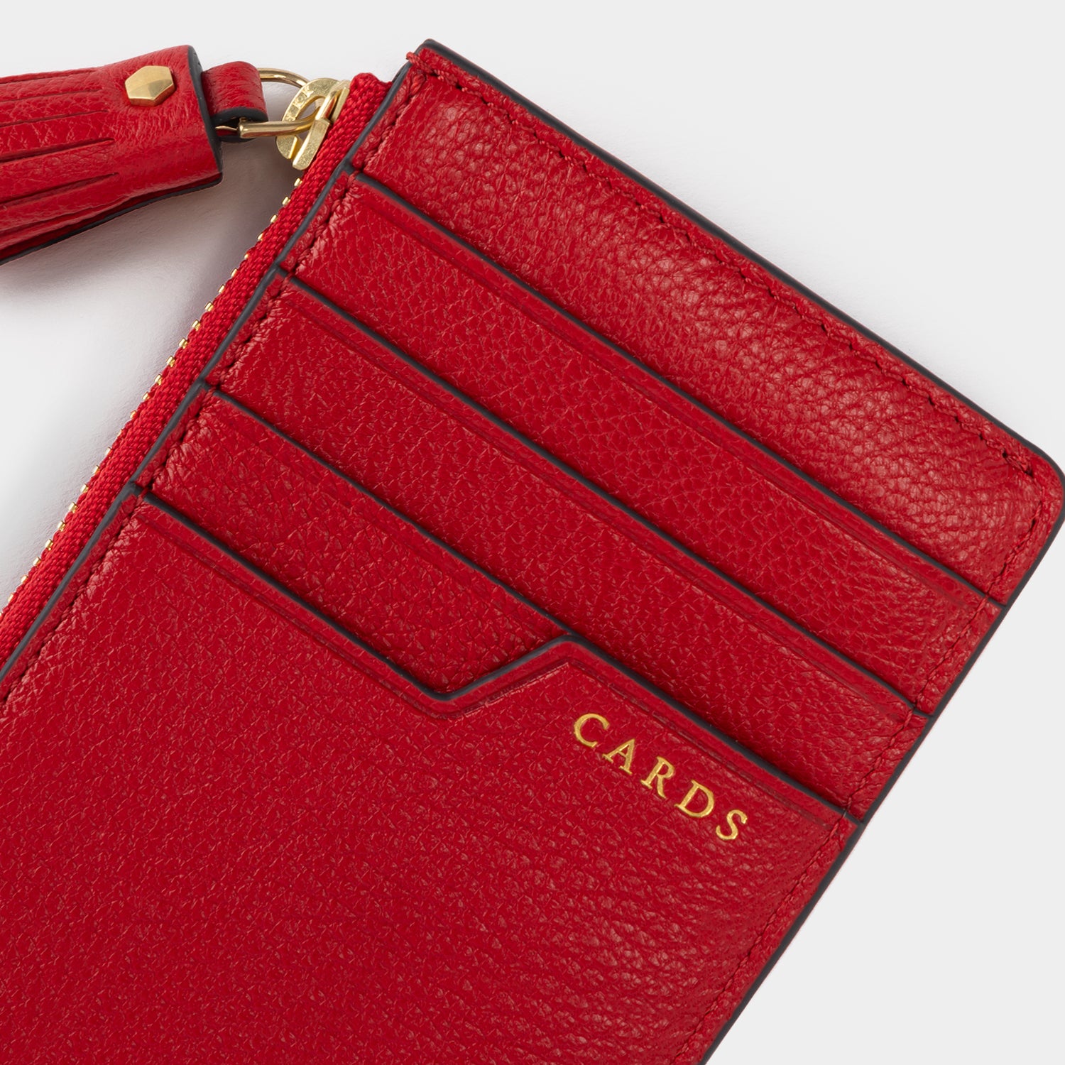 美品 Anya Hindmarch タッセルゴースト バーガンディ シアリング Anya Brands Milky Zip Card Case | Anya Hindmarch US