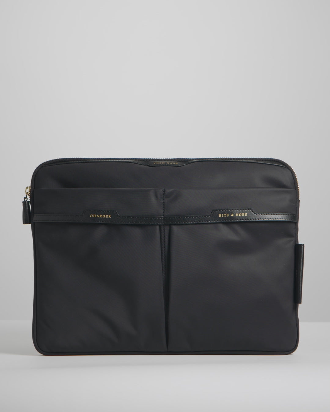 Technology Case -

          
            Econyl® Regenerated Nylon in Black -
          

          Anya Hindmarch US
