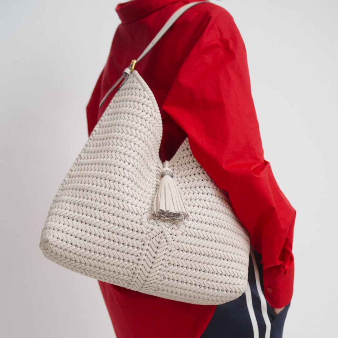 Neeson Tassel Hobo Bag -

          
            Capra Leather in Chalk -
          

          Anya Hindmarch US
