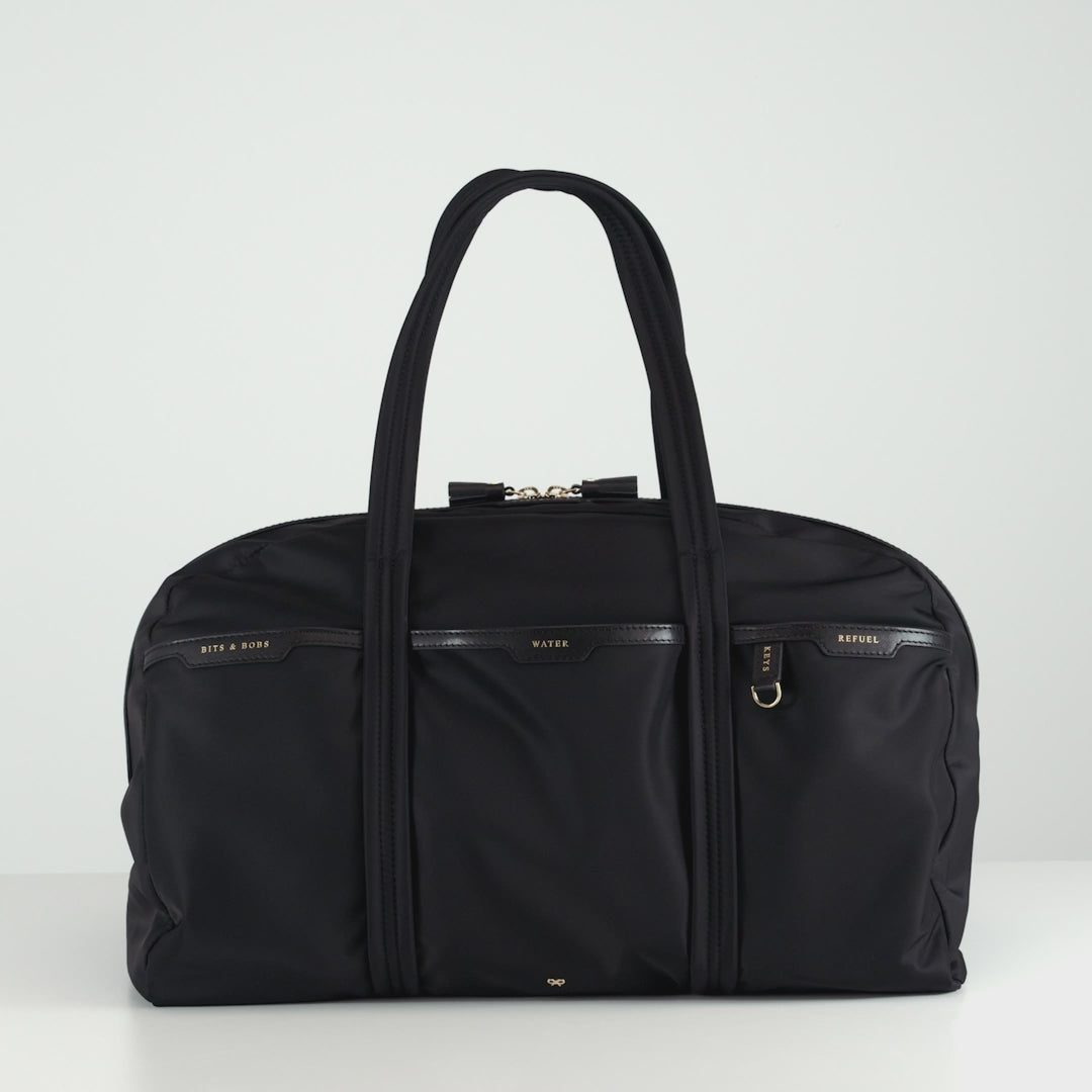 Gym Bag -

          
            Regenerated ECONYL® Nylon in Black -
          

          Anya Hindmarch US
