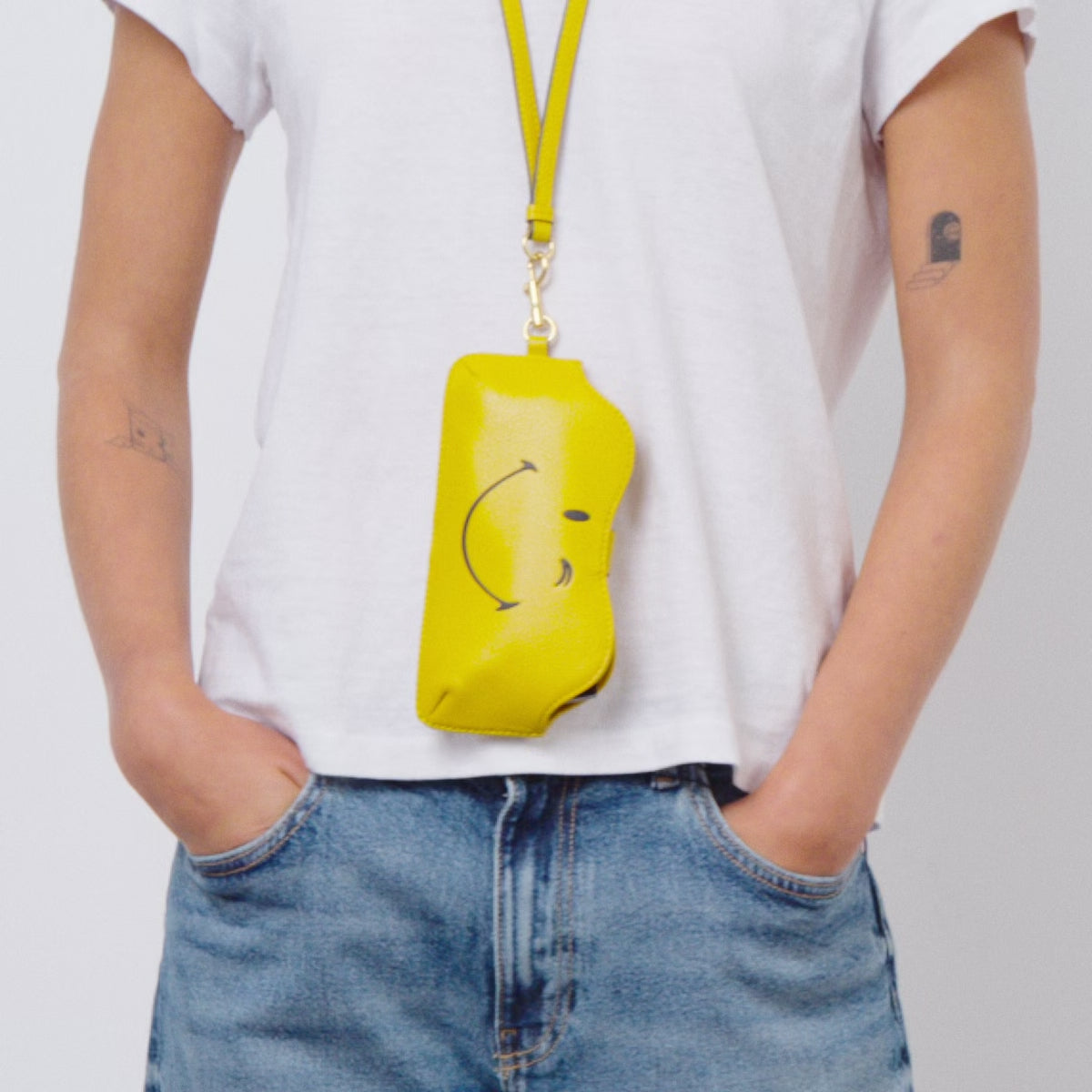 Wink Sunglasses Holder -

          
            Capra Leather in Mustard Yellow -
          

          Anya Hindmarch US
