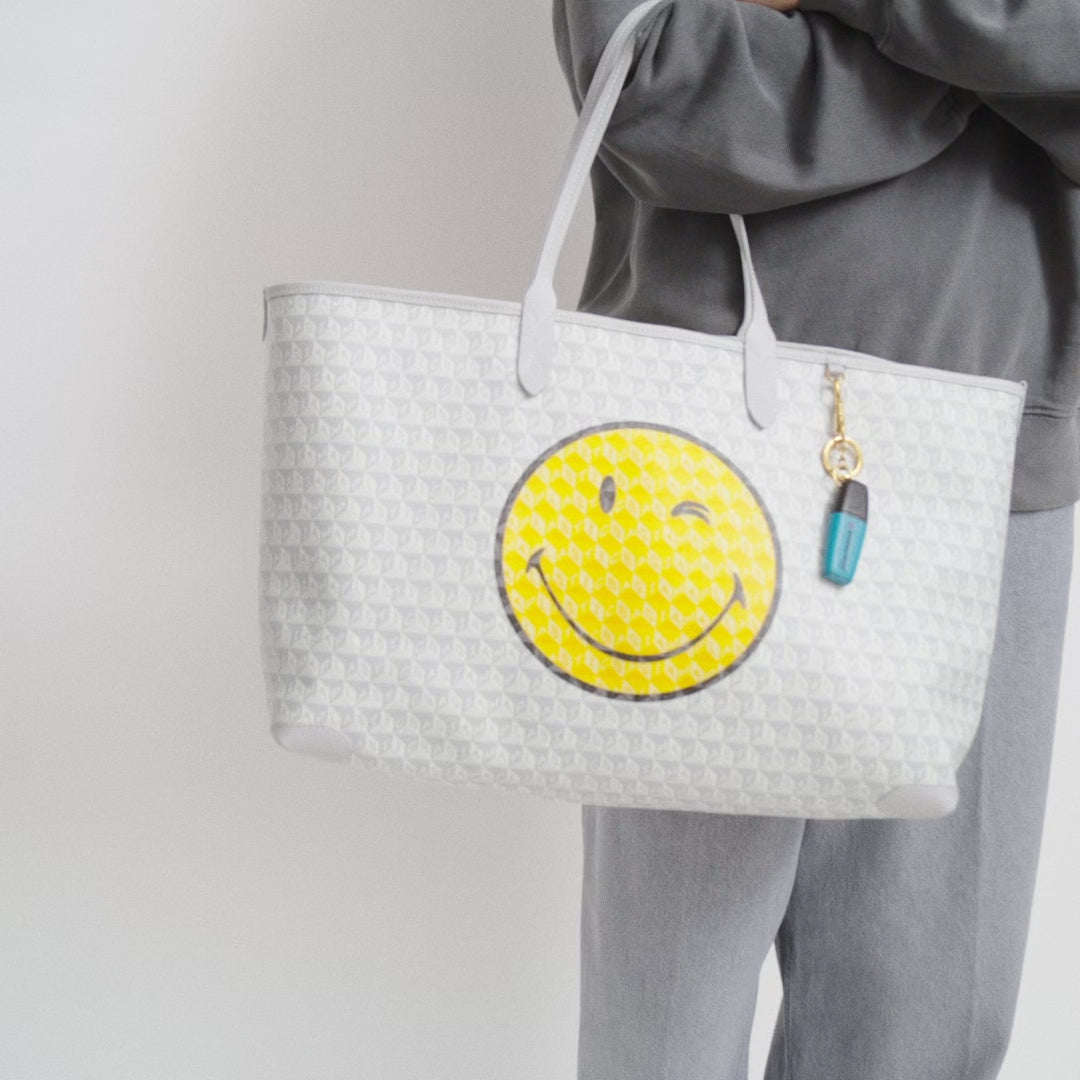 I Am A Plastic Bag Wink Zipped Tote -

          
            Recycled Canvas in Frost -
          

          Anya Hindmarch US

